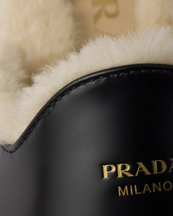 Brushed leather and shearling mules Brushed leather and shearling mules