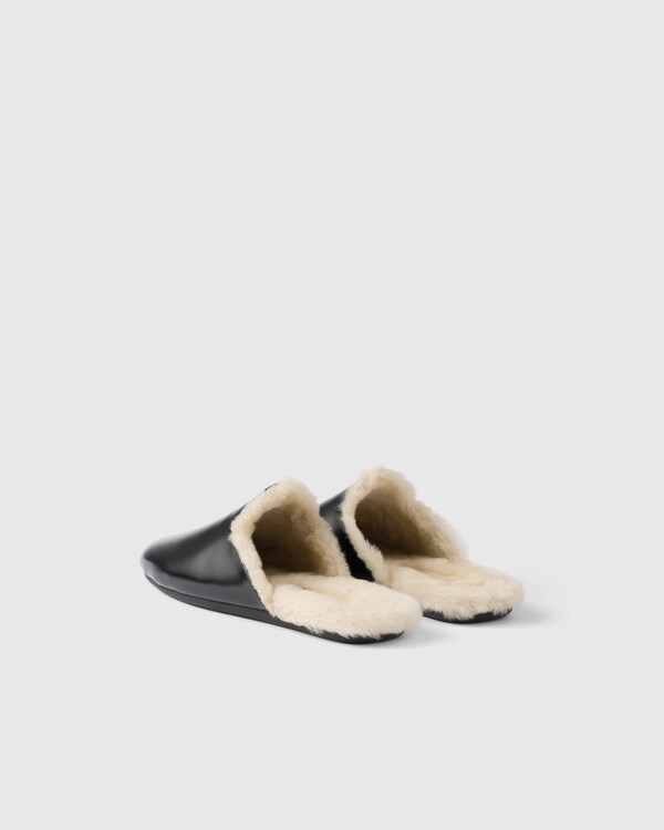 Brushed leather and shearling mules Brushed leather and shearling mules