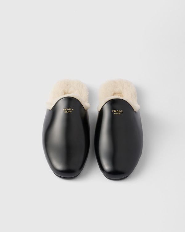Brushed leather and shearling mules Brushed leather and shearling mules