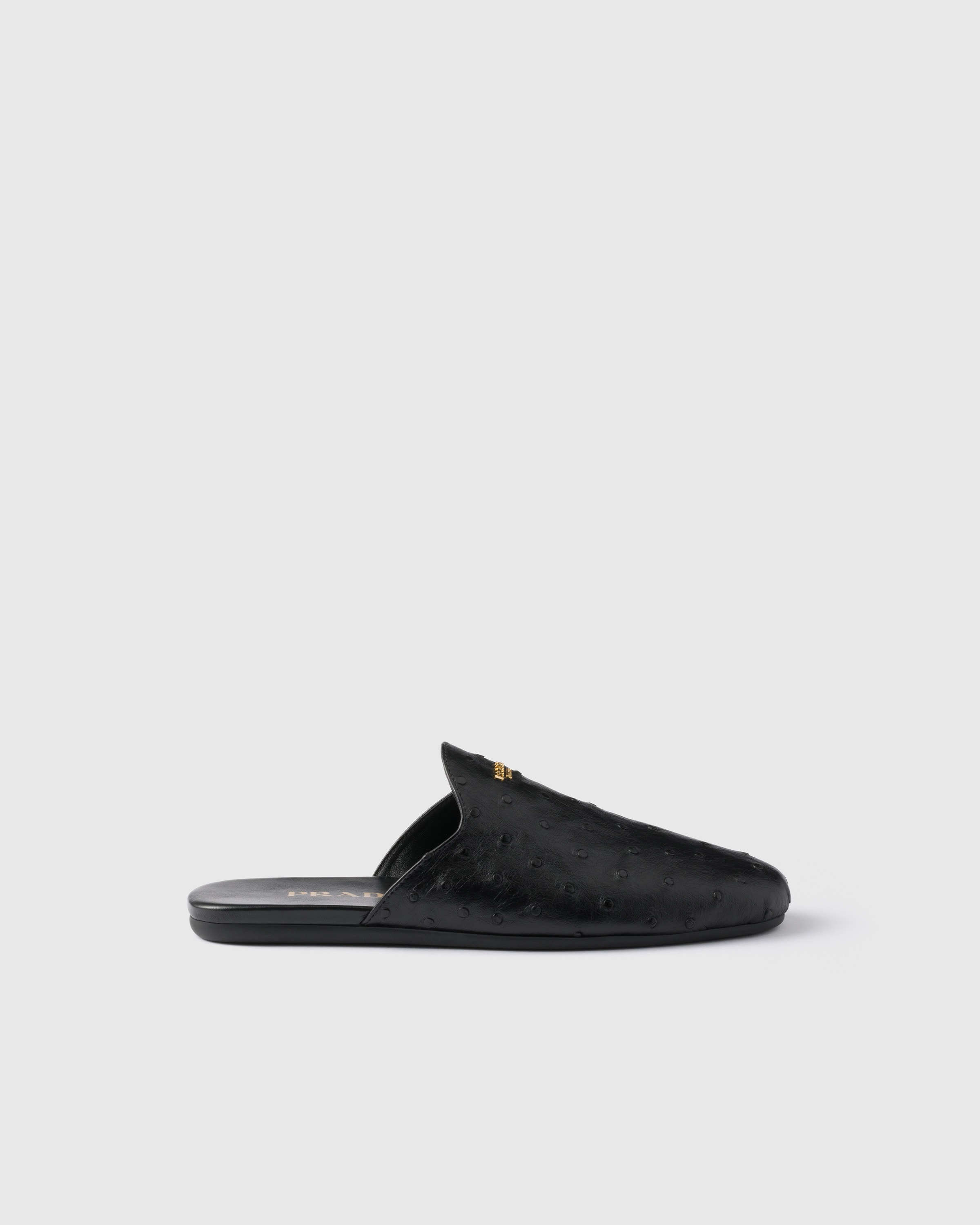 Prada Mules Aus Straussenleder In Schwarz