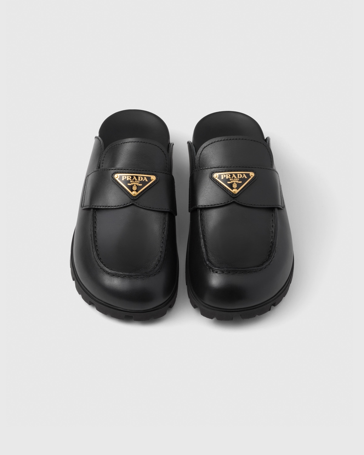 Prada Beige Calf Leather Bos Taurus Mules