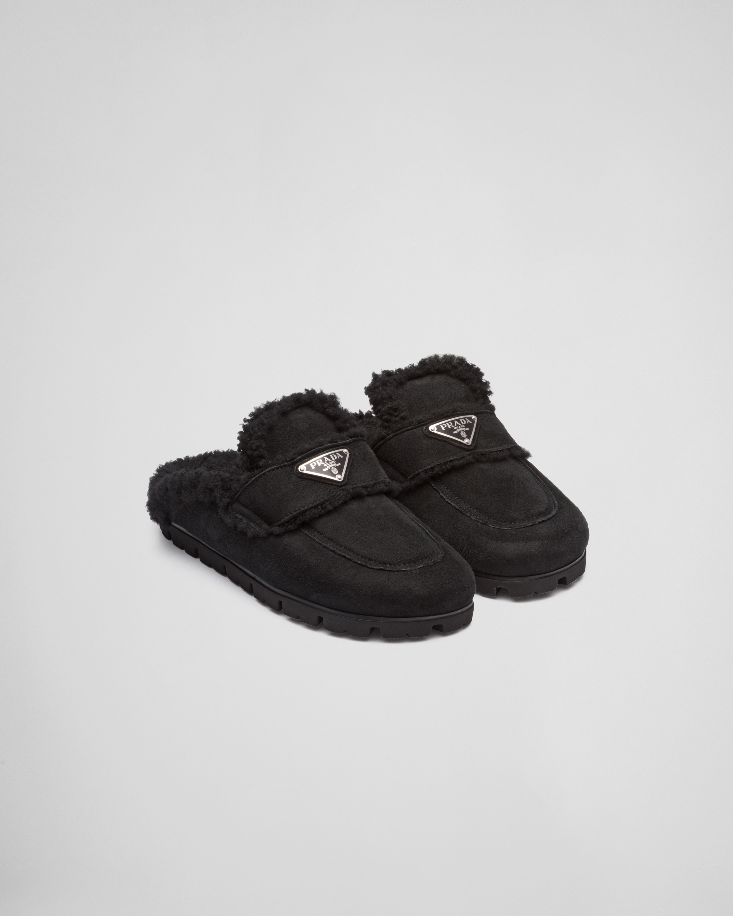 cap Lui kogel Black Shearling slippers | Prada