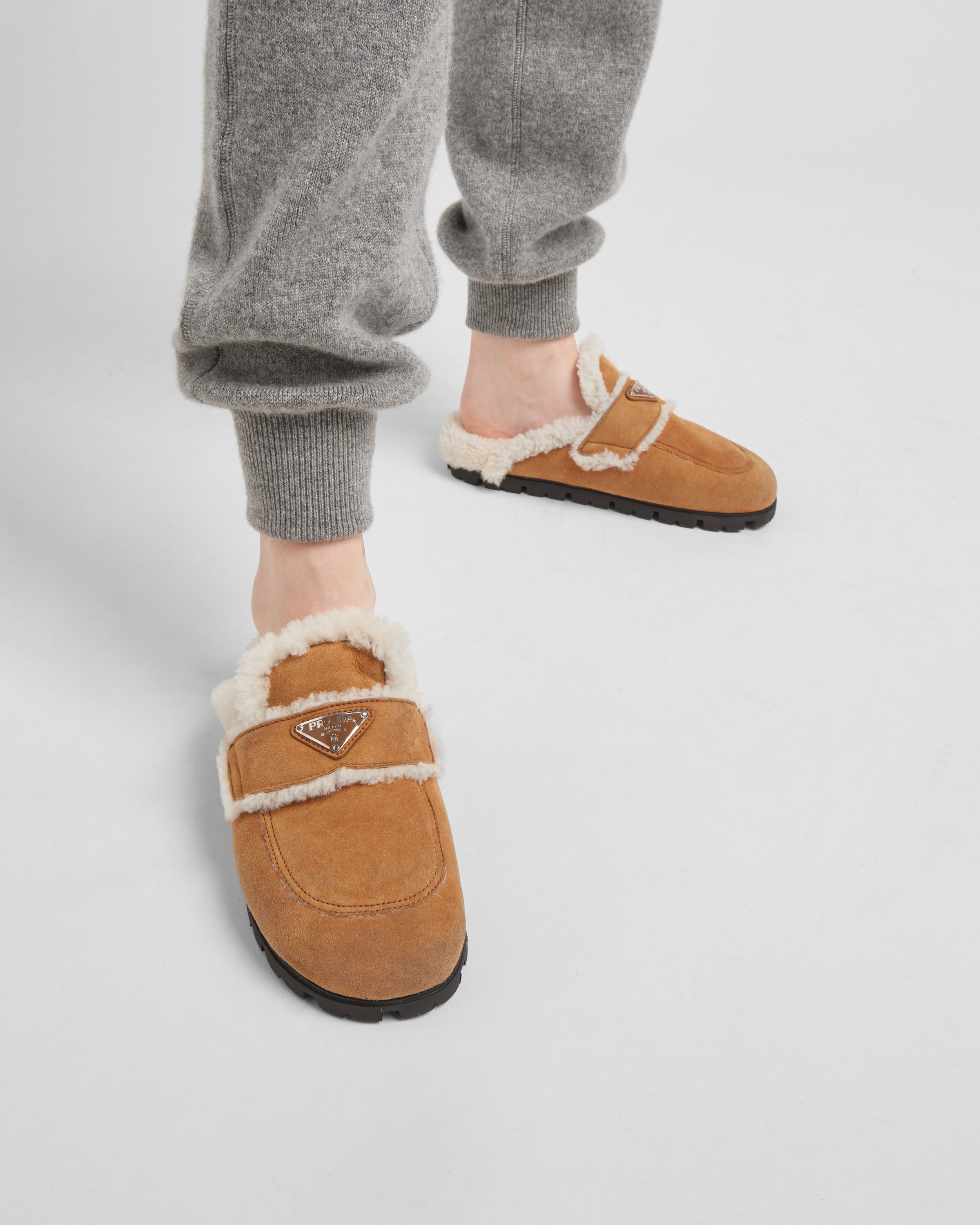 Cognac Shearling slippers | Prada