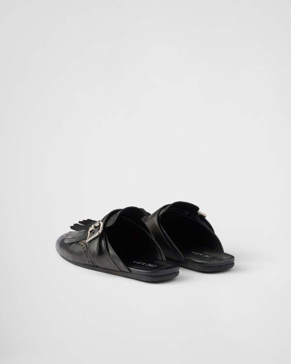 Shuffle fringed leather mules Shuffle fringed leather mules