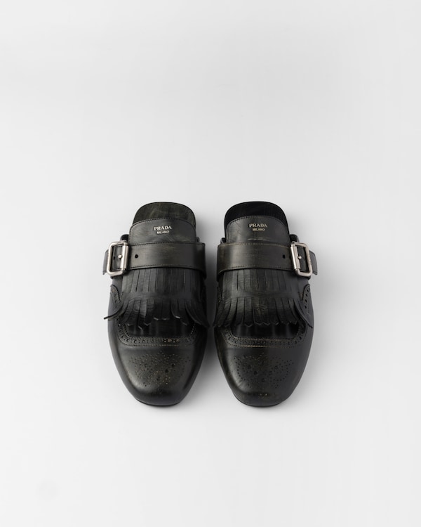 Shuffle fringed leather mules Shuffle fringed leather mules