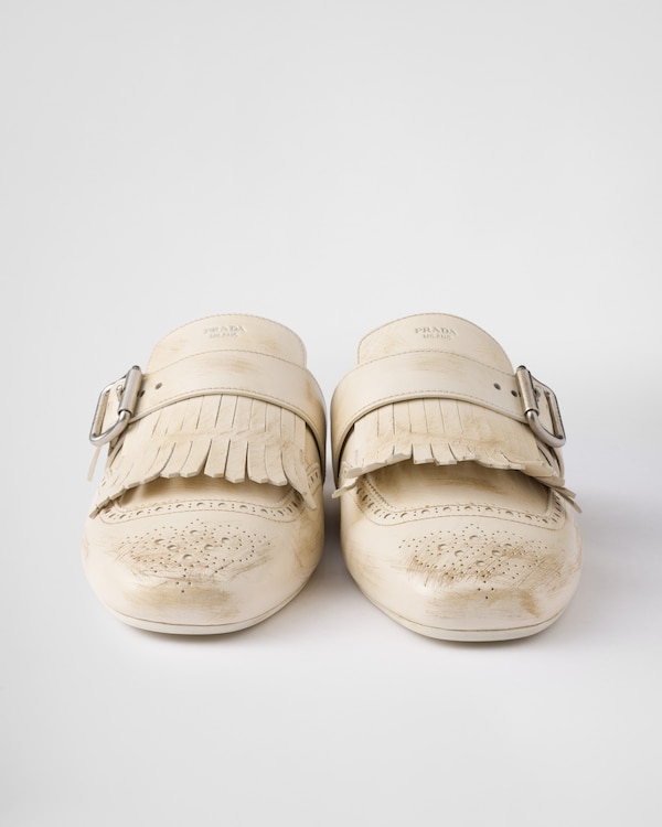 Shuffle fringed leather mules Shuffle fringed leather mules