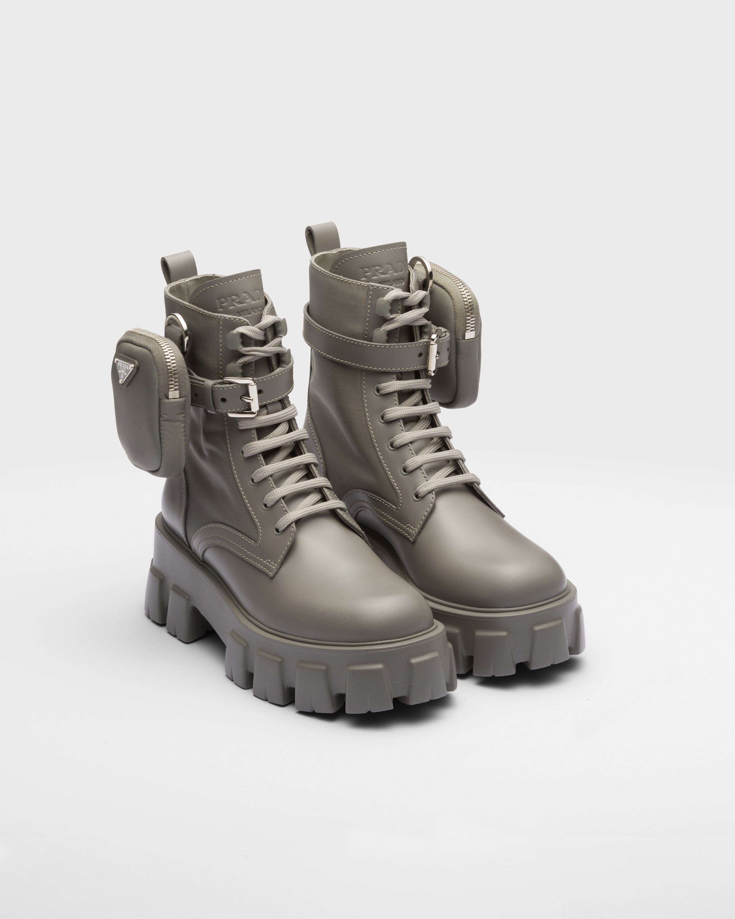 Prada Monolith Leather And Re-nylon Boots With Pouch In Grey