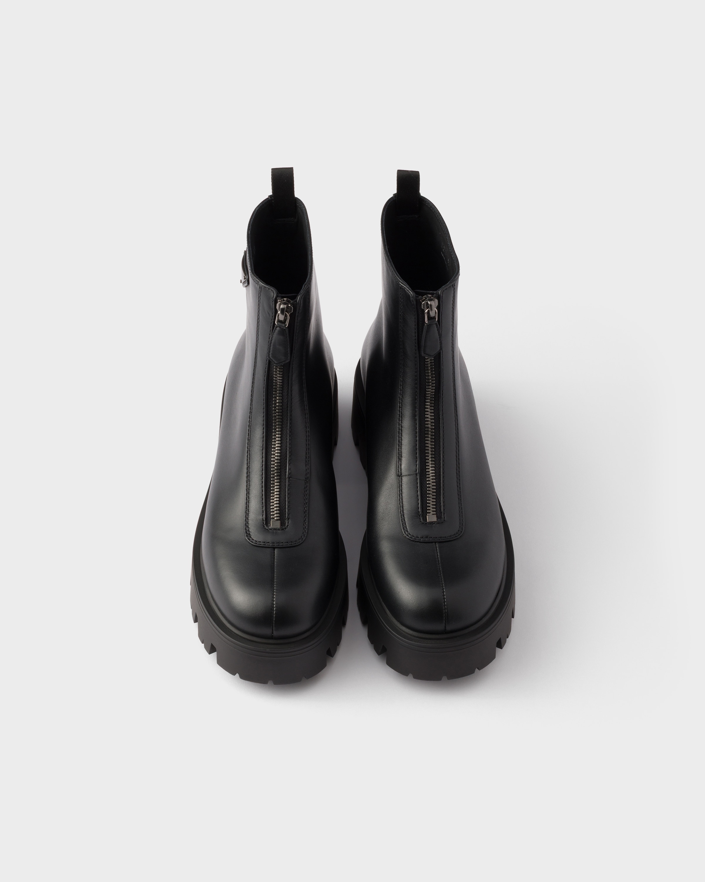 Black Leather zipper booties | PRADA - United States