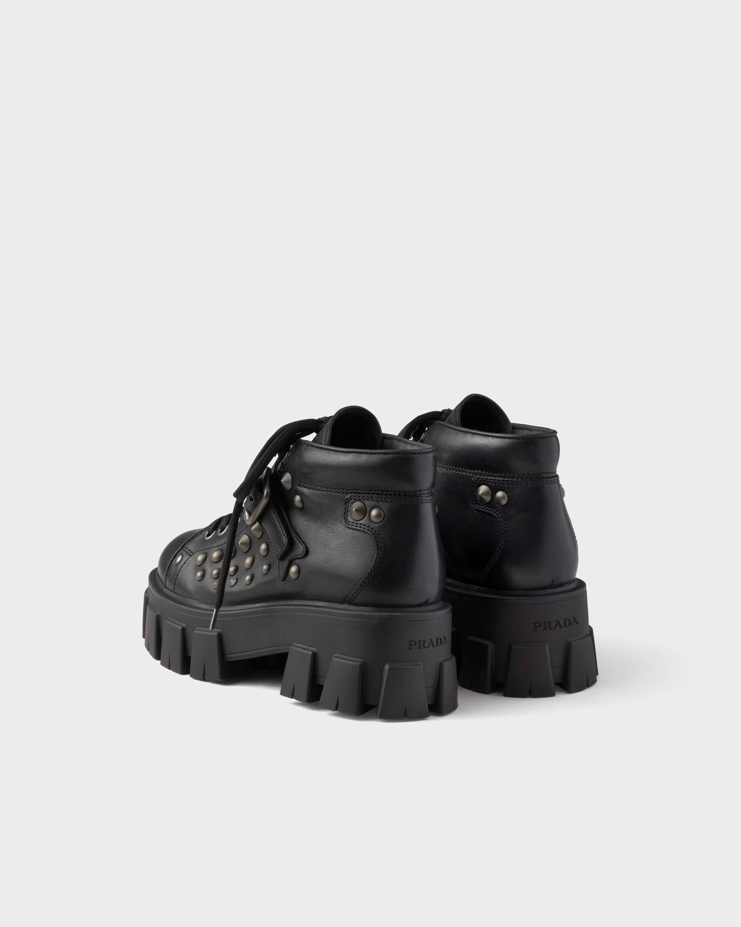 Black Monolith Studded Leather Booties | PRADA