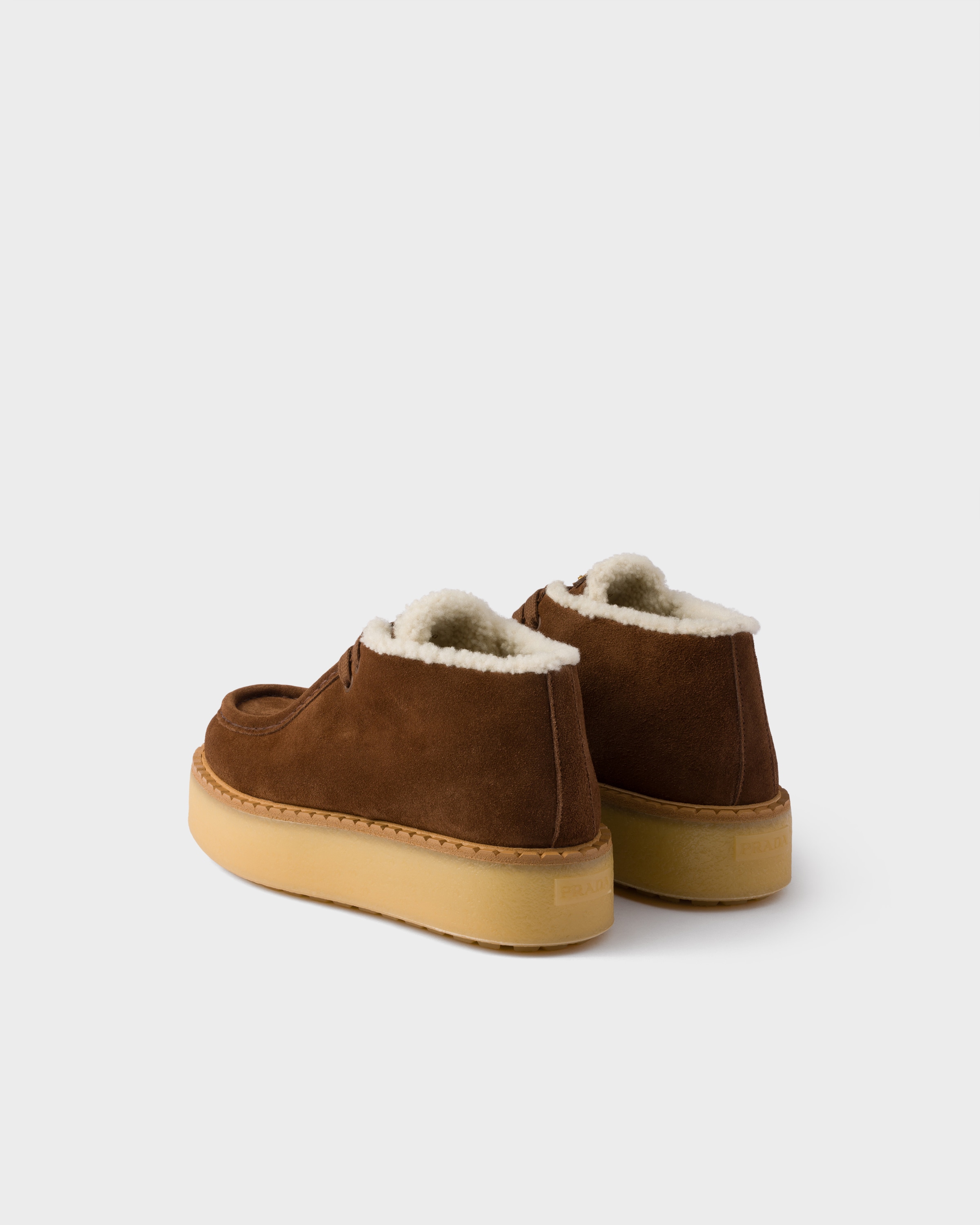 Prada Suede Shearling Lace-up Booties In Brown