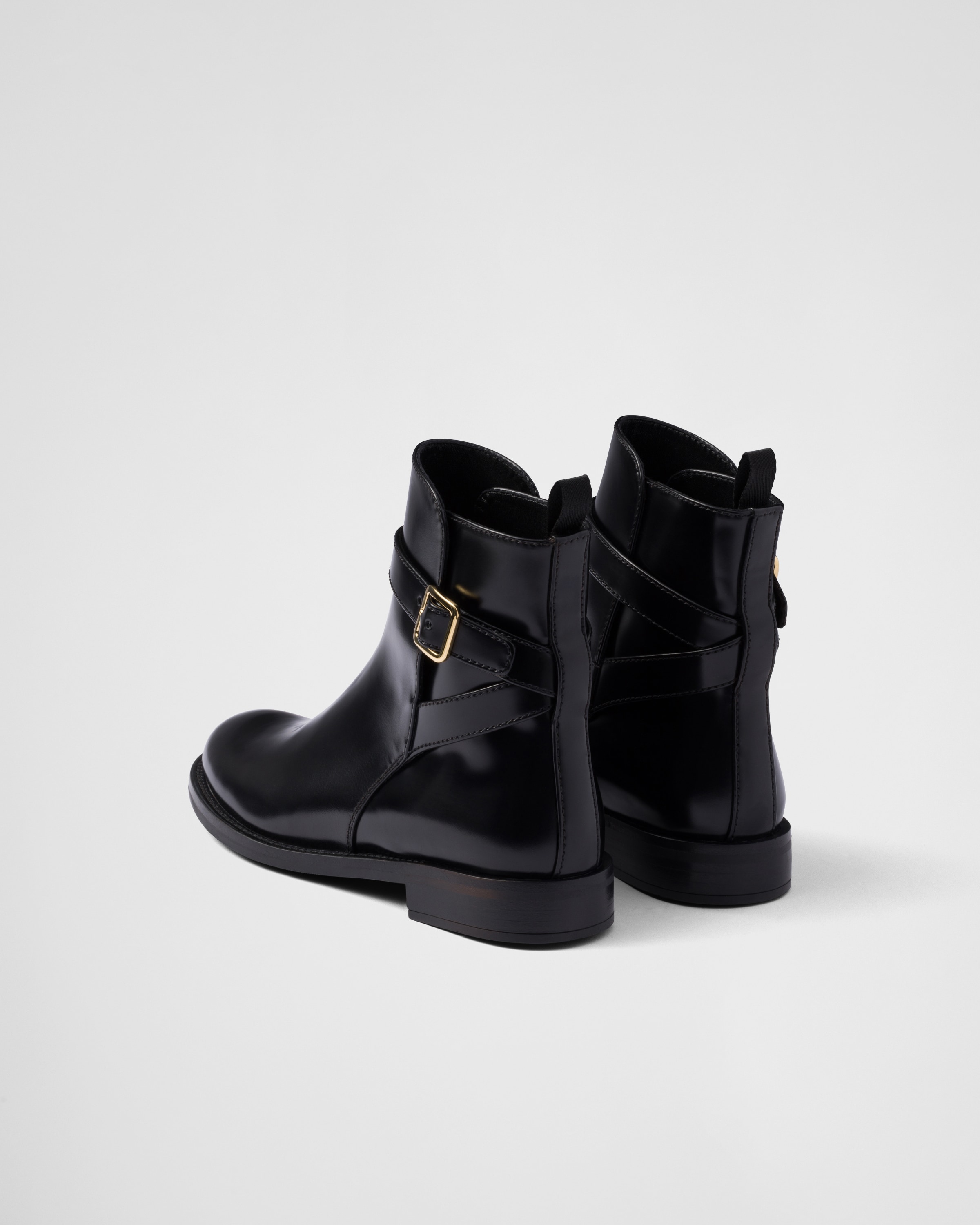 Prada Brushed Leather Ankle Boots With Strap In Black