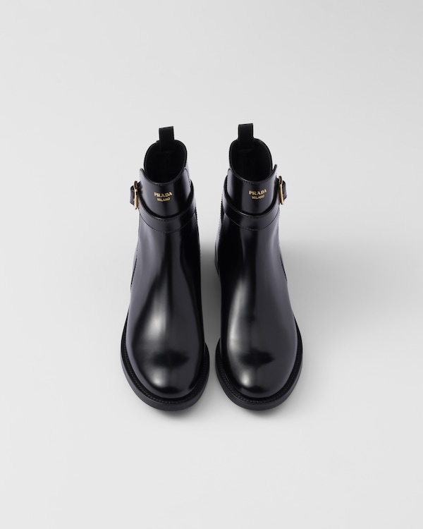 Brushed leather ankle boots with strap Brushed leather ankle boots with strap