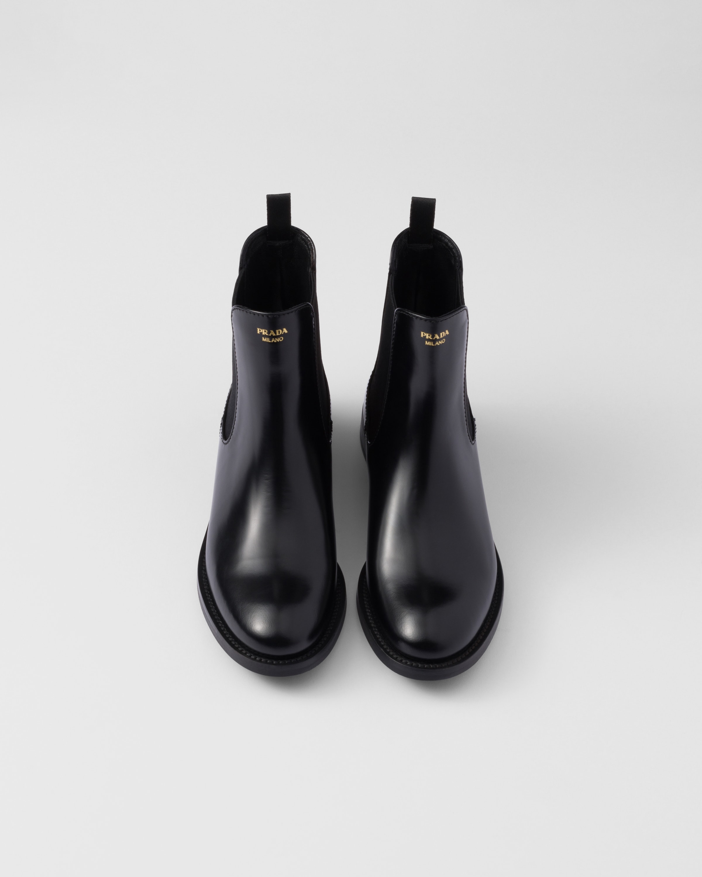 Prada Brushed Leather Ankle Boots In Black