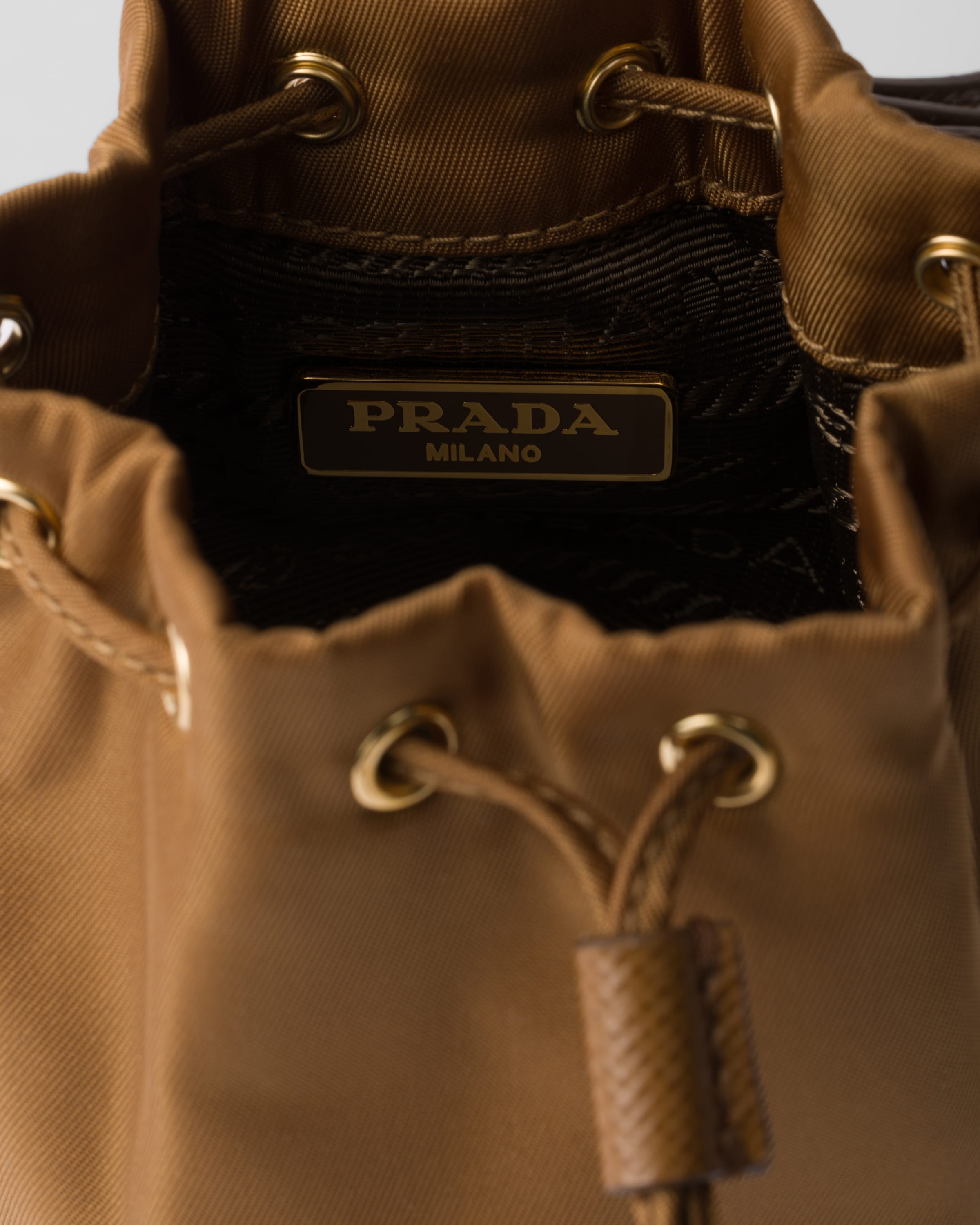 Prada Mini Icon Re-nylon Bag Charm In Brandy