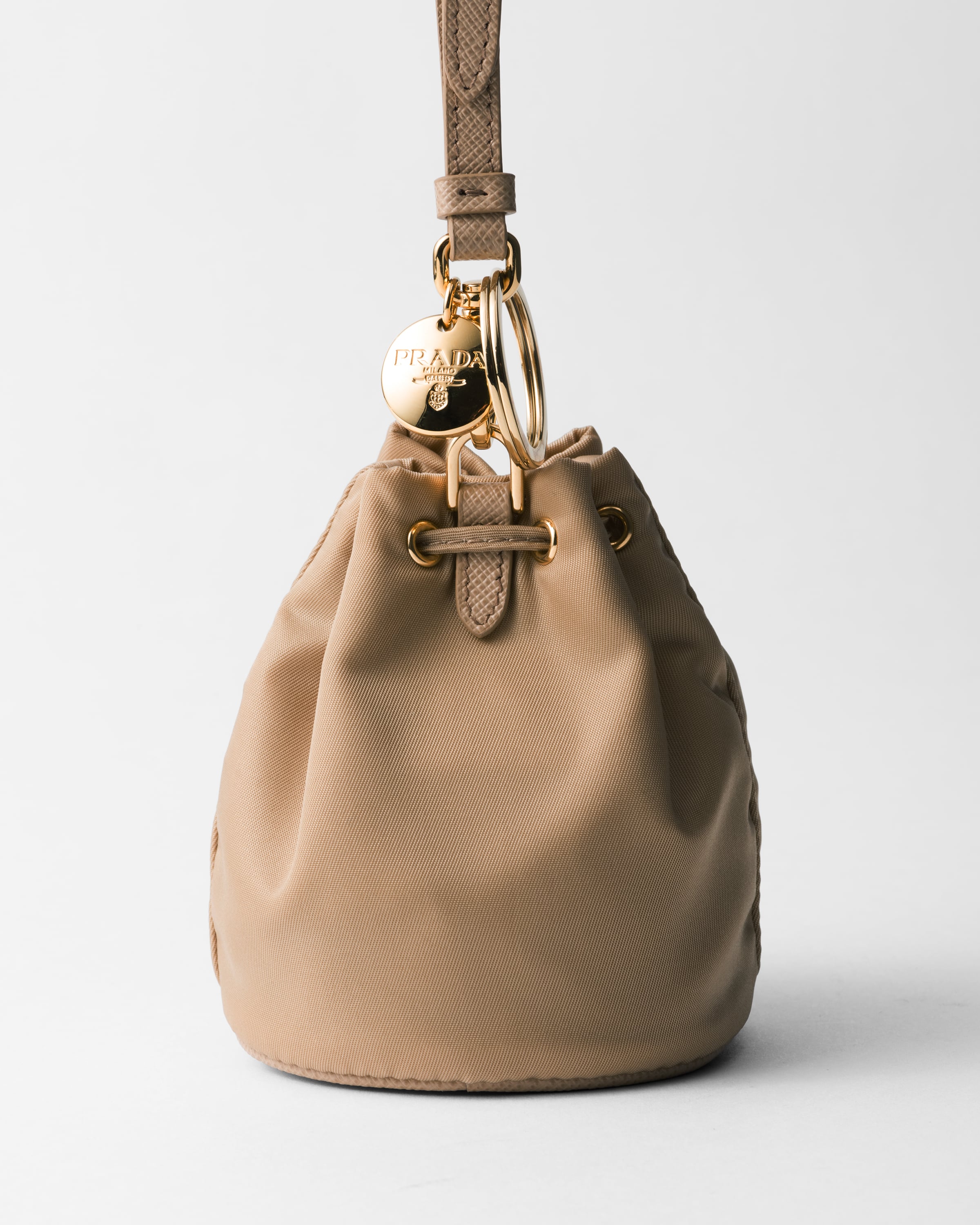 Prada Re-edition 1978 Re-nylon Mini-pouch In Korkbeige+flaschengrün