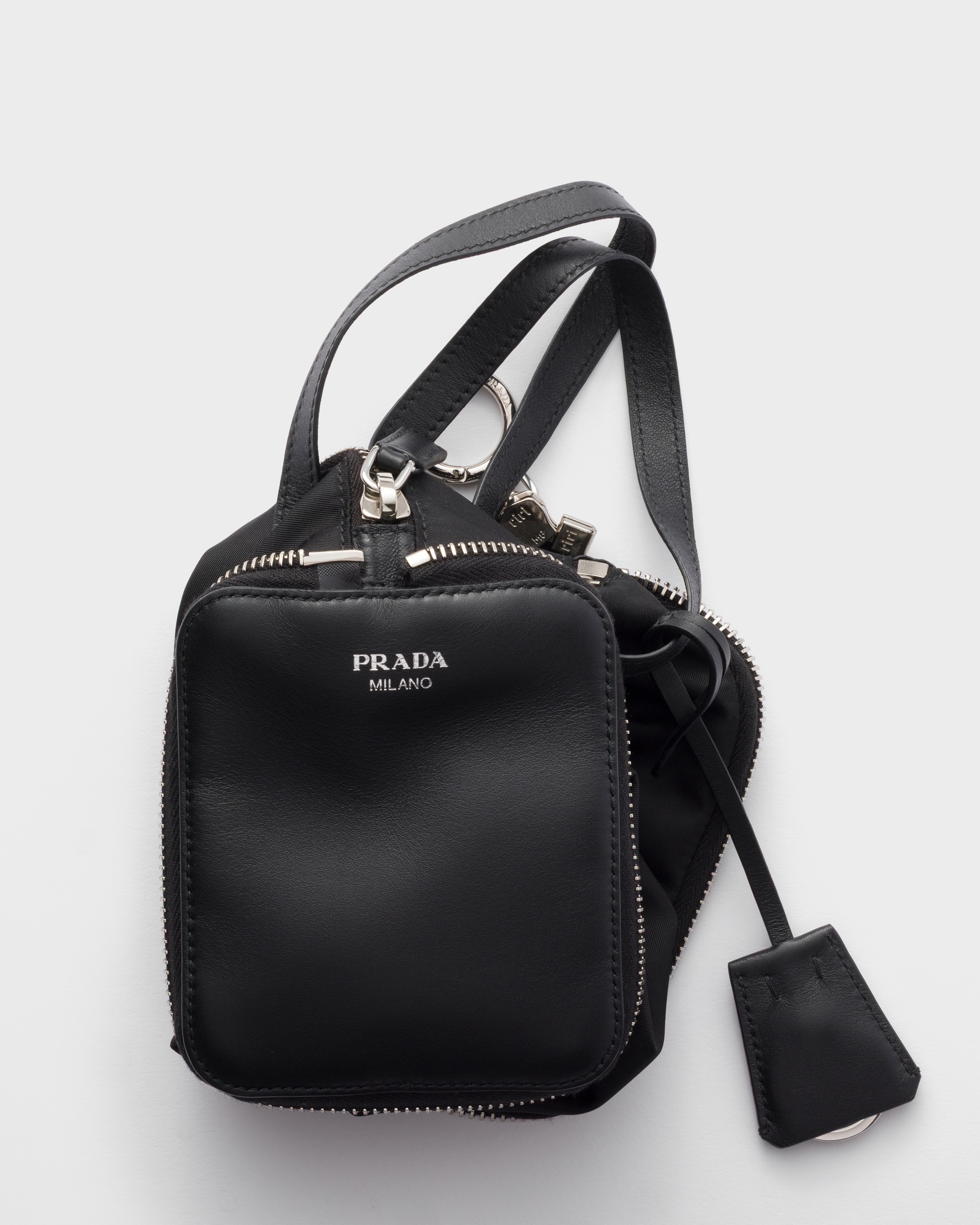 Black Re-nylon And Leather Foldable Mini Duffel Bag | PRADA