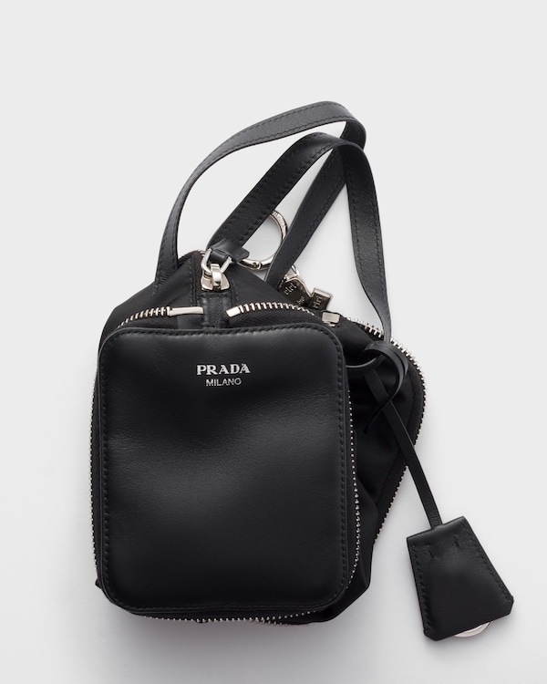 Re-Nylon and leather foldable mini duffel bag - Black Re-Nylon and leather foldable mini duffel bag - Black