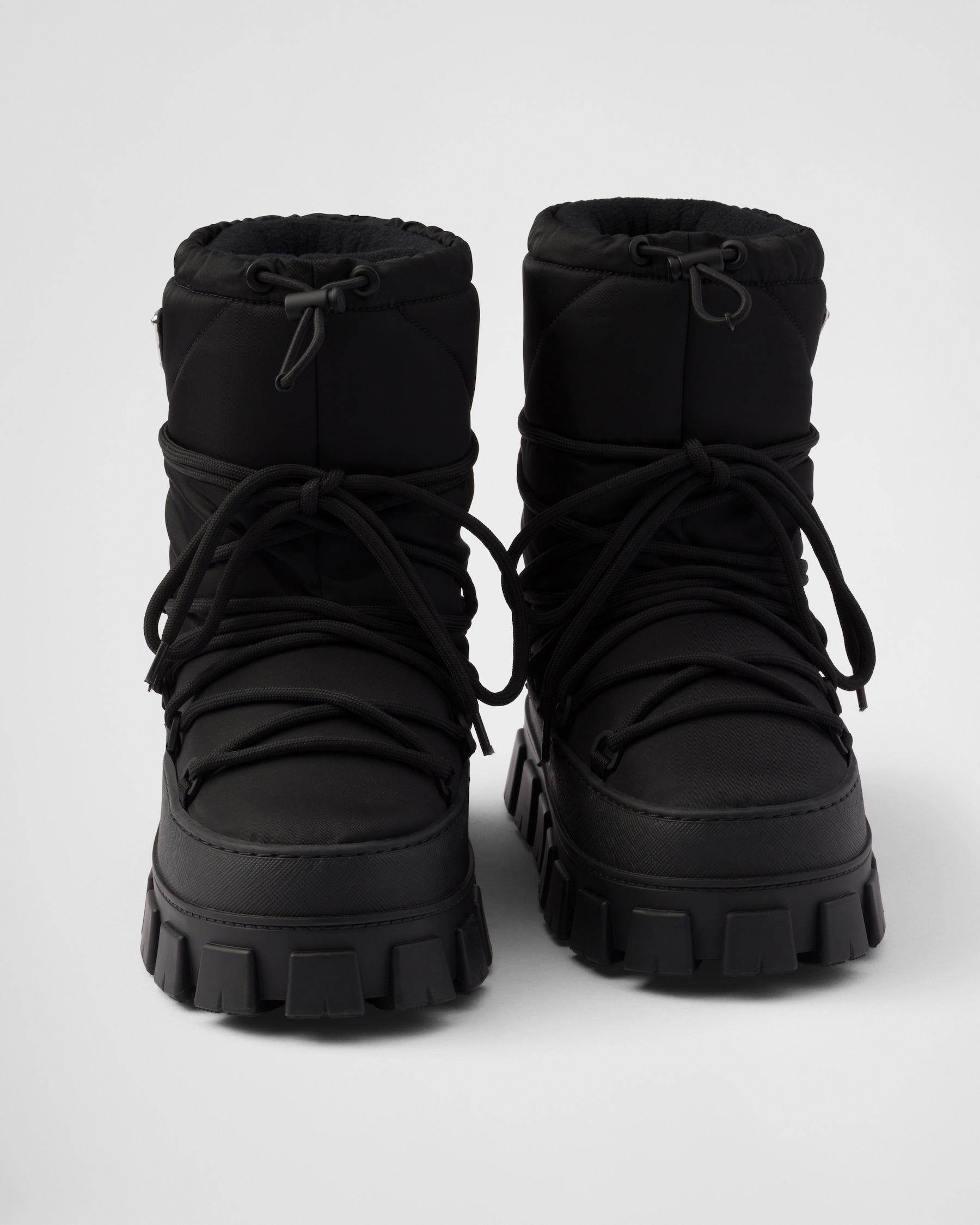 PRADA 25S SNOW BOOTS  IN WHITE CALFSKIN
