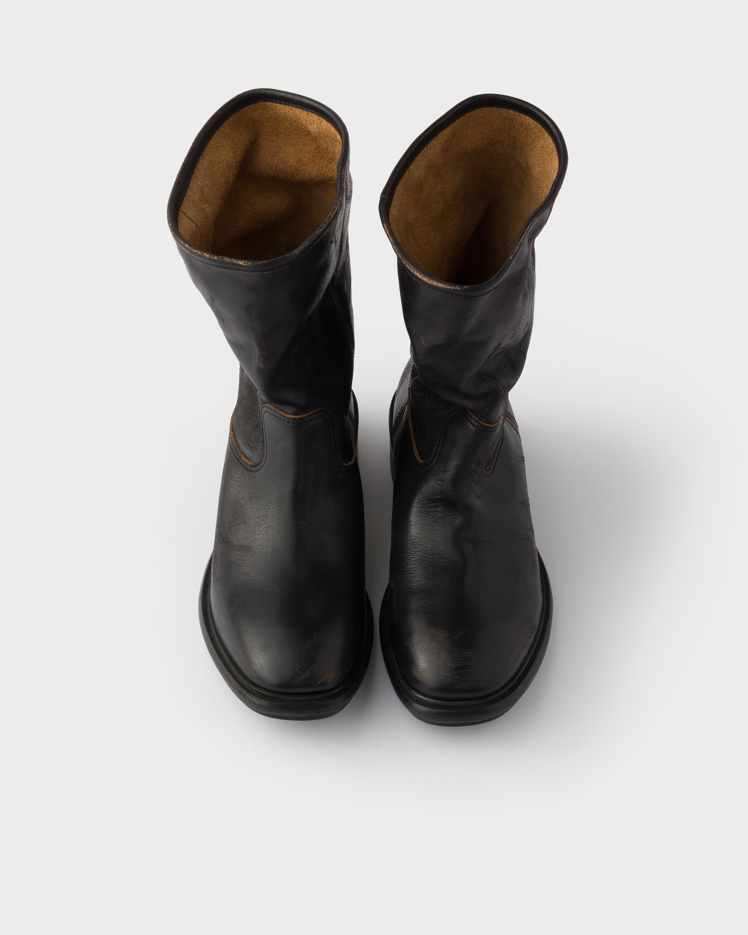 Black Vintage-effect leather boots | PRADA - United States