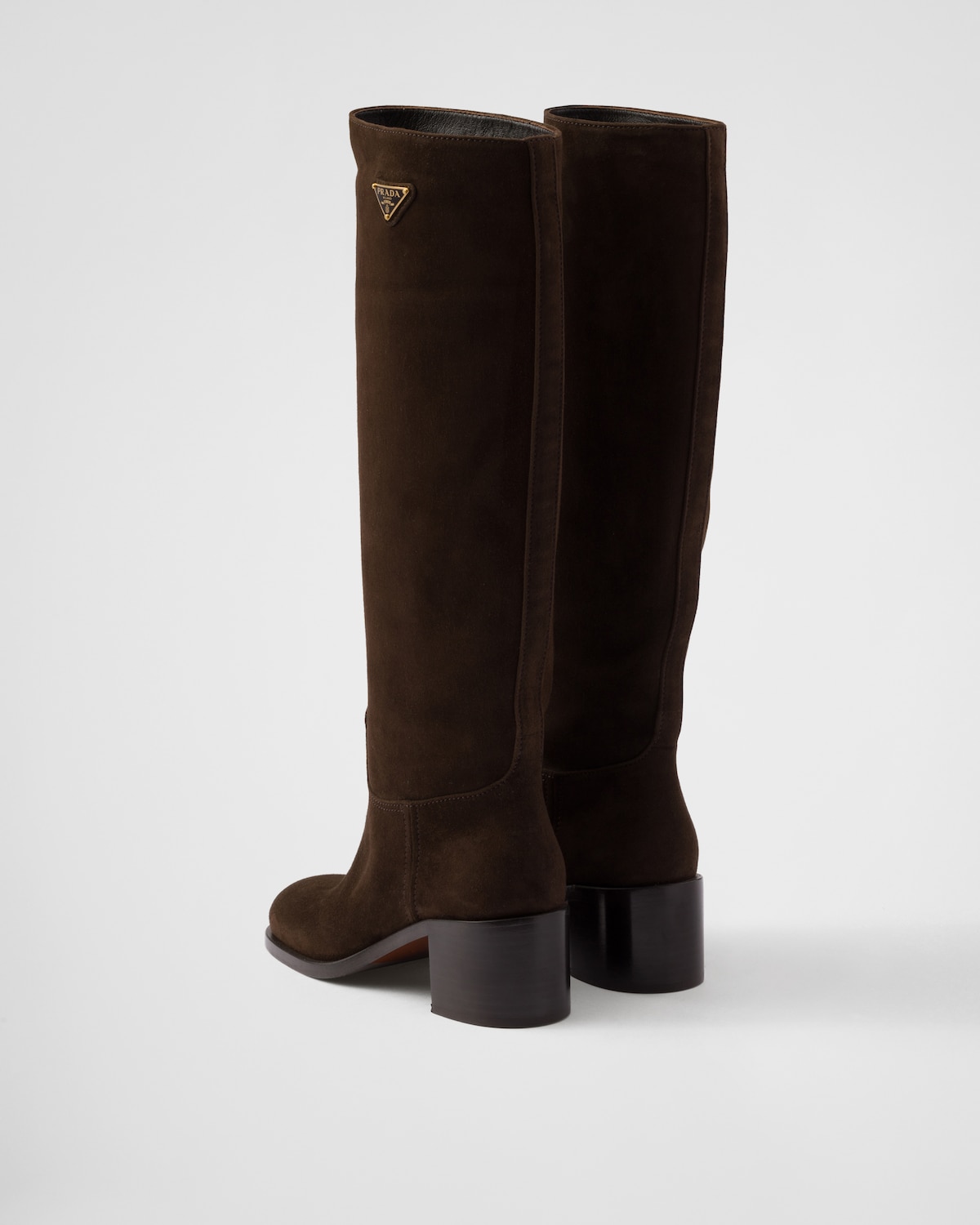 PRADA 25S CLOGS IN BROWN SUEDE FUR-LINED