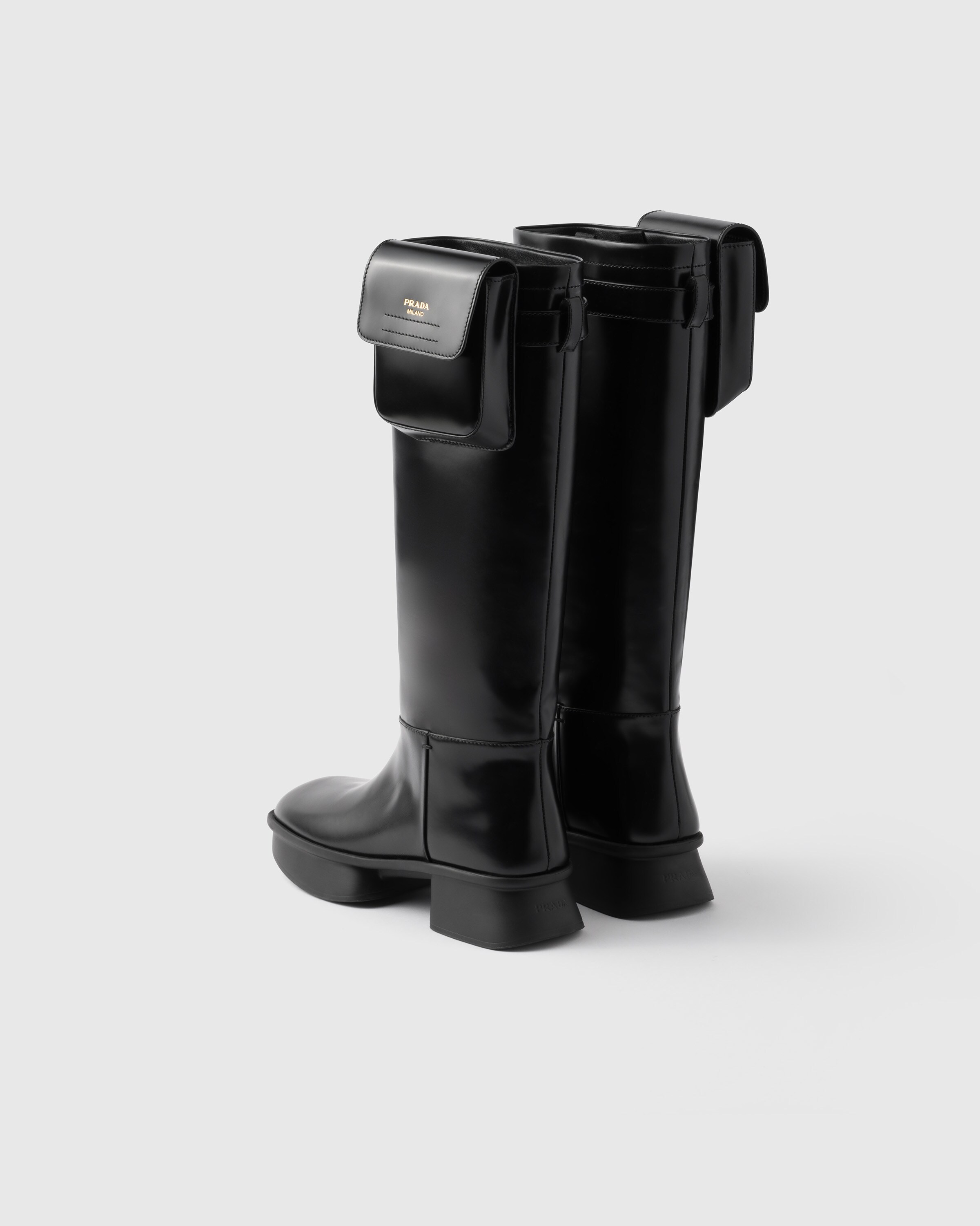 Shop Prada Brushed Leather Boots With Pouch In Black