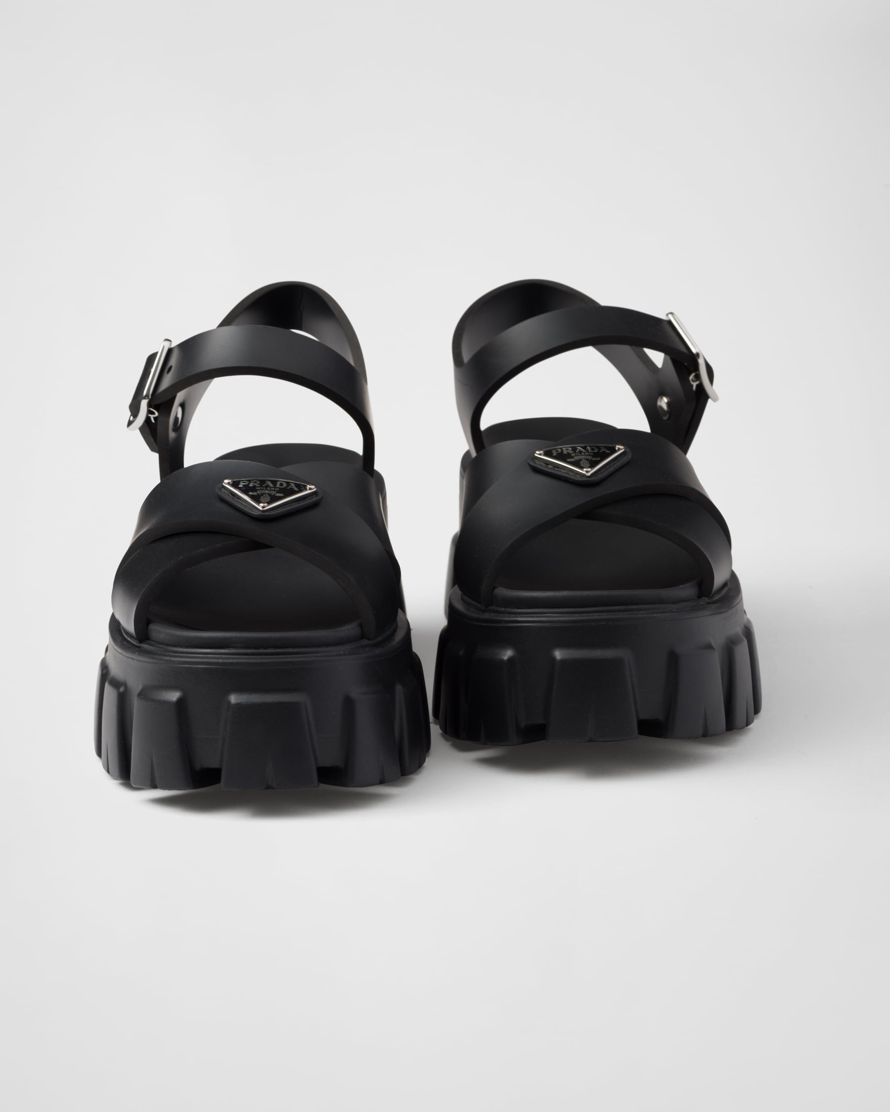 PRADA 25S MONOLITH RUBBER MULES IN BLACK RAFFIA AND LAMBSKIN