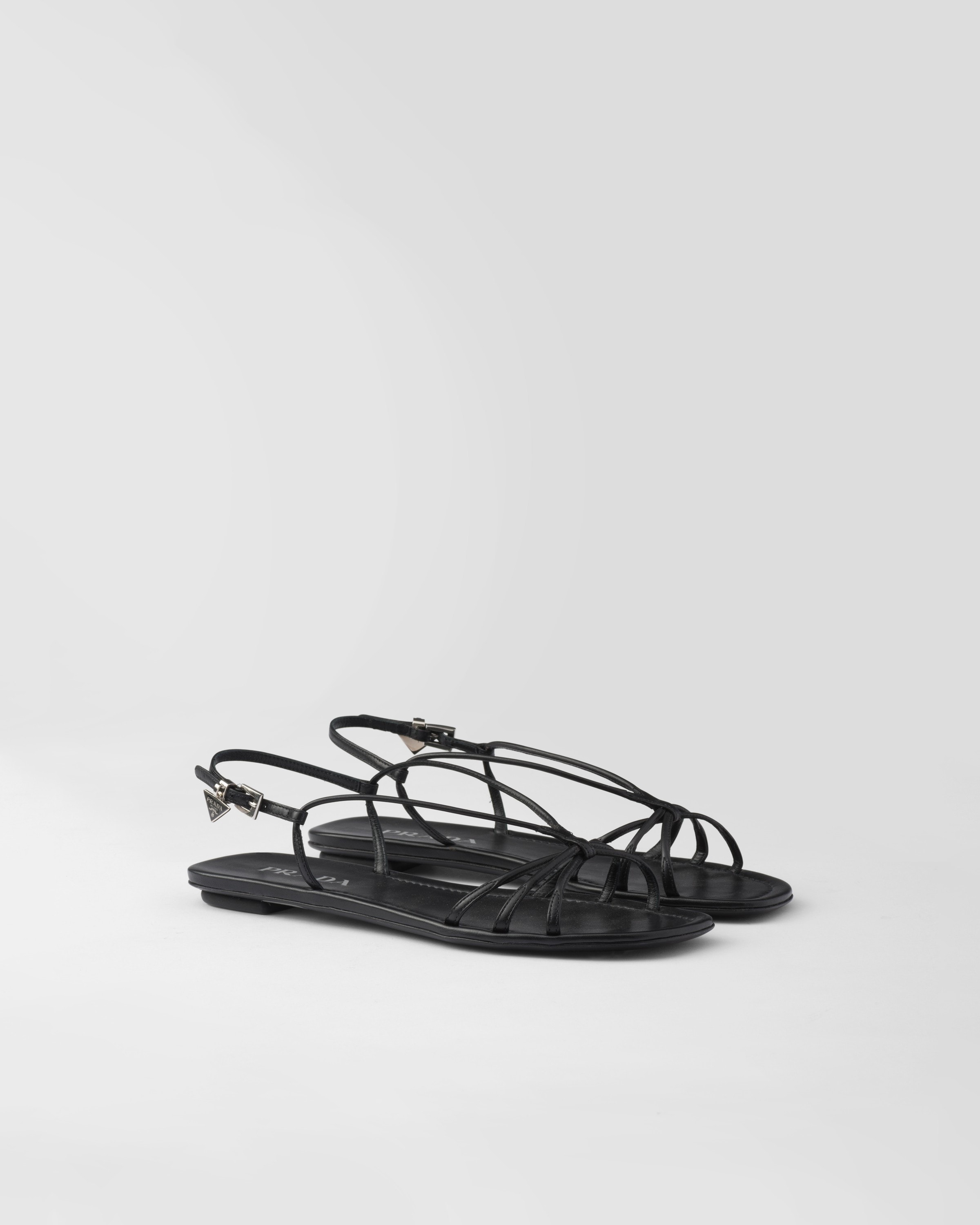 Prada Flat Leather Sandals In Black