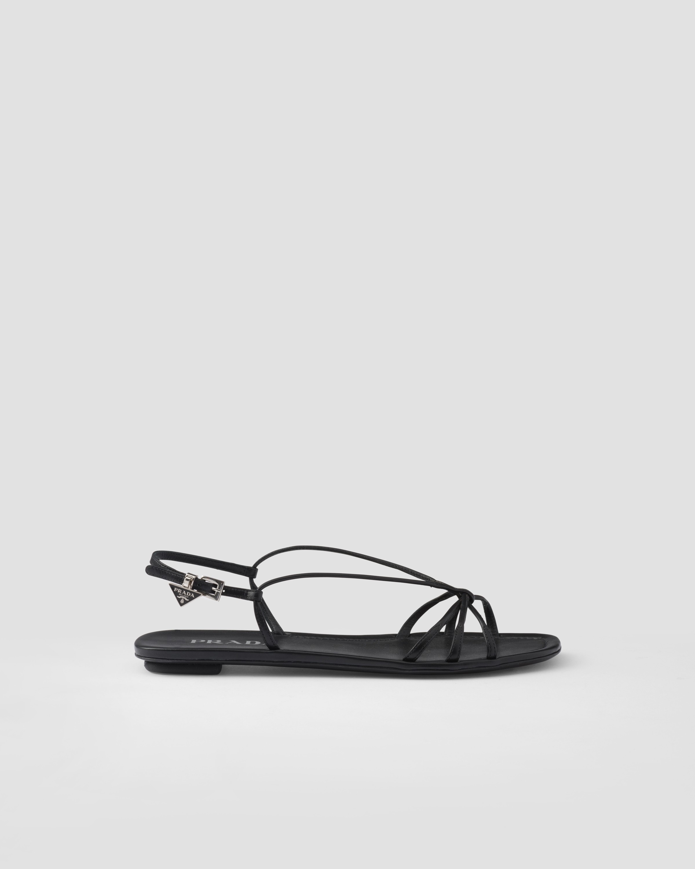 Shop Prada Flat Leather Sandals In Black