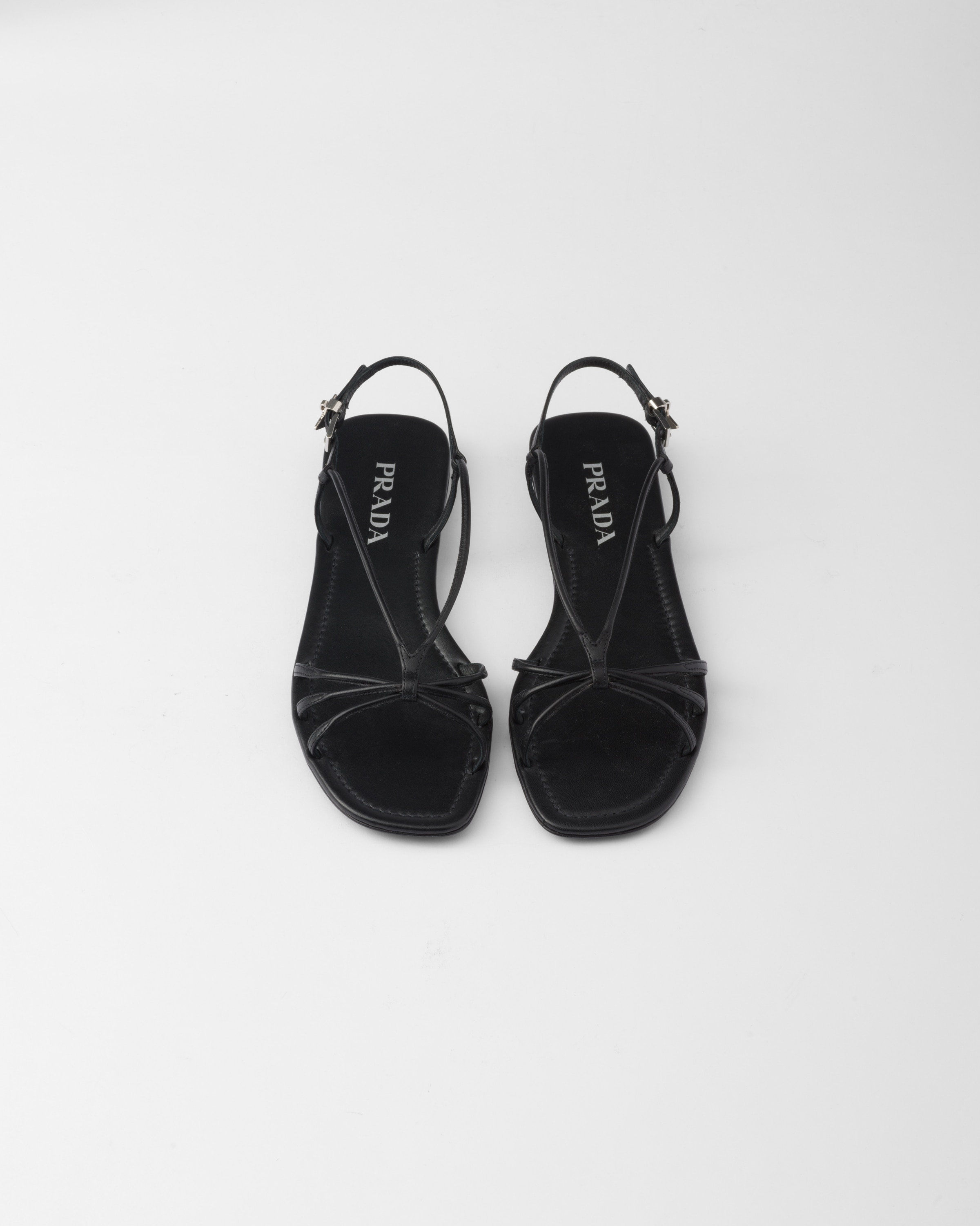 Shop Prada Flat Leather Sandals In Black