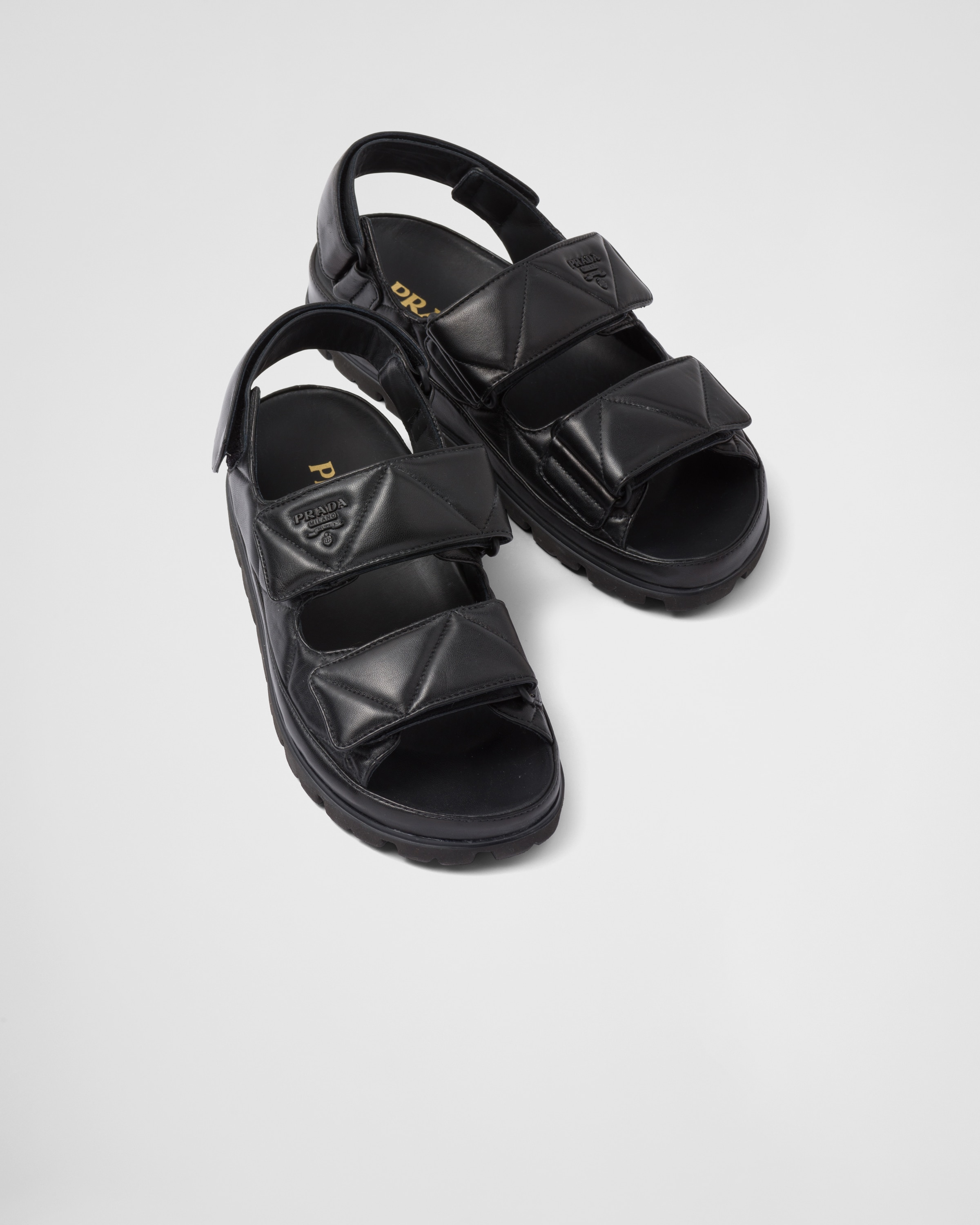 Shop Prada Sandalen Aus Gepolstertem Nappa-leder In Black