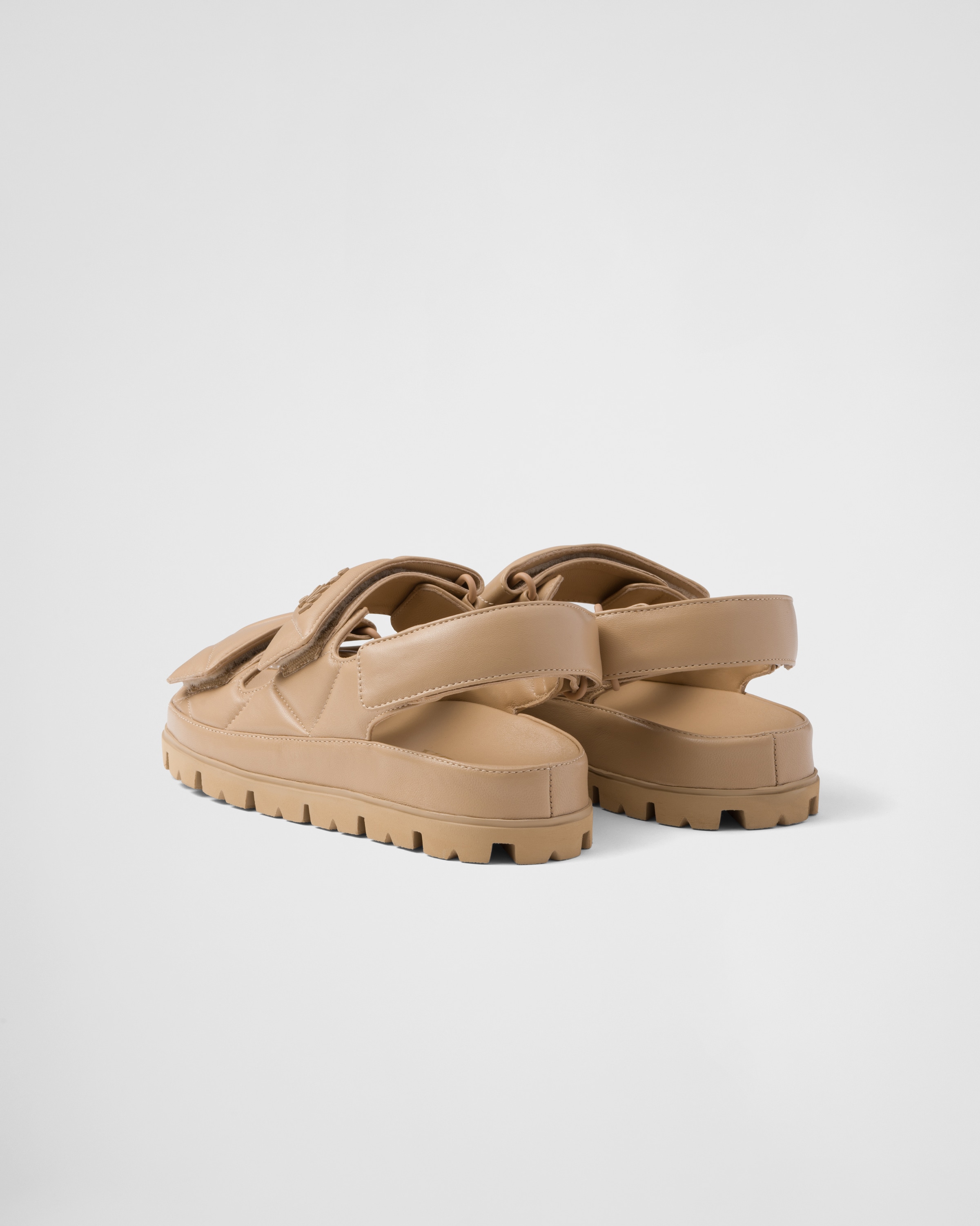 Shop Prada Padded Nappa Leather Sandals In Sand Beige