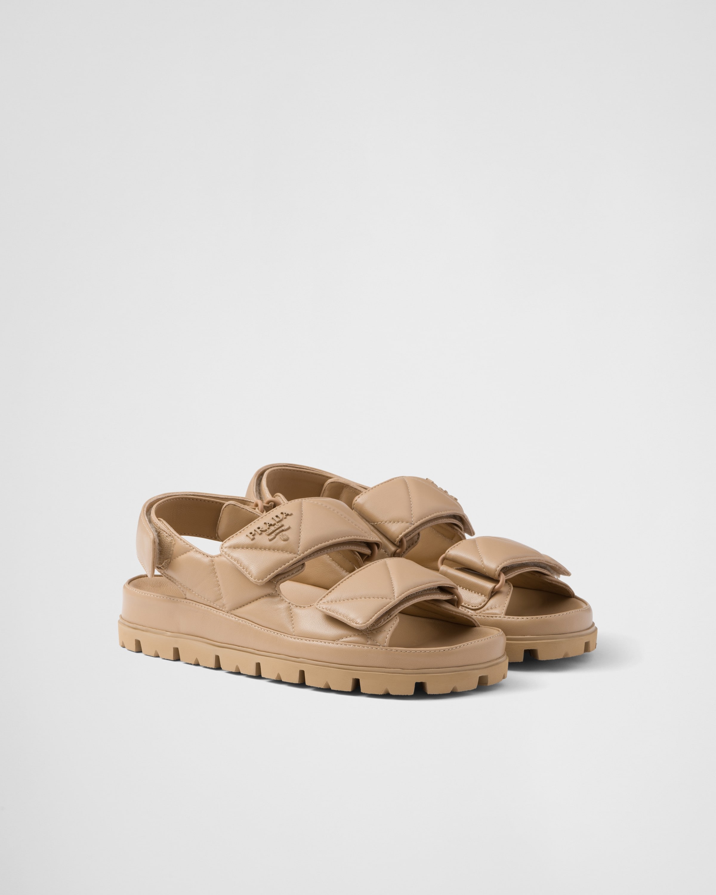 Shop Prada Padded Nappa Leather Sandals In Sand Beige