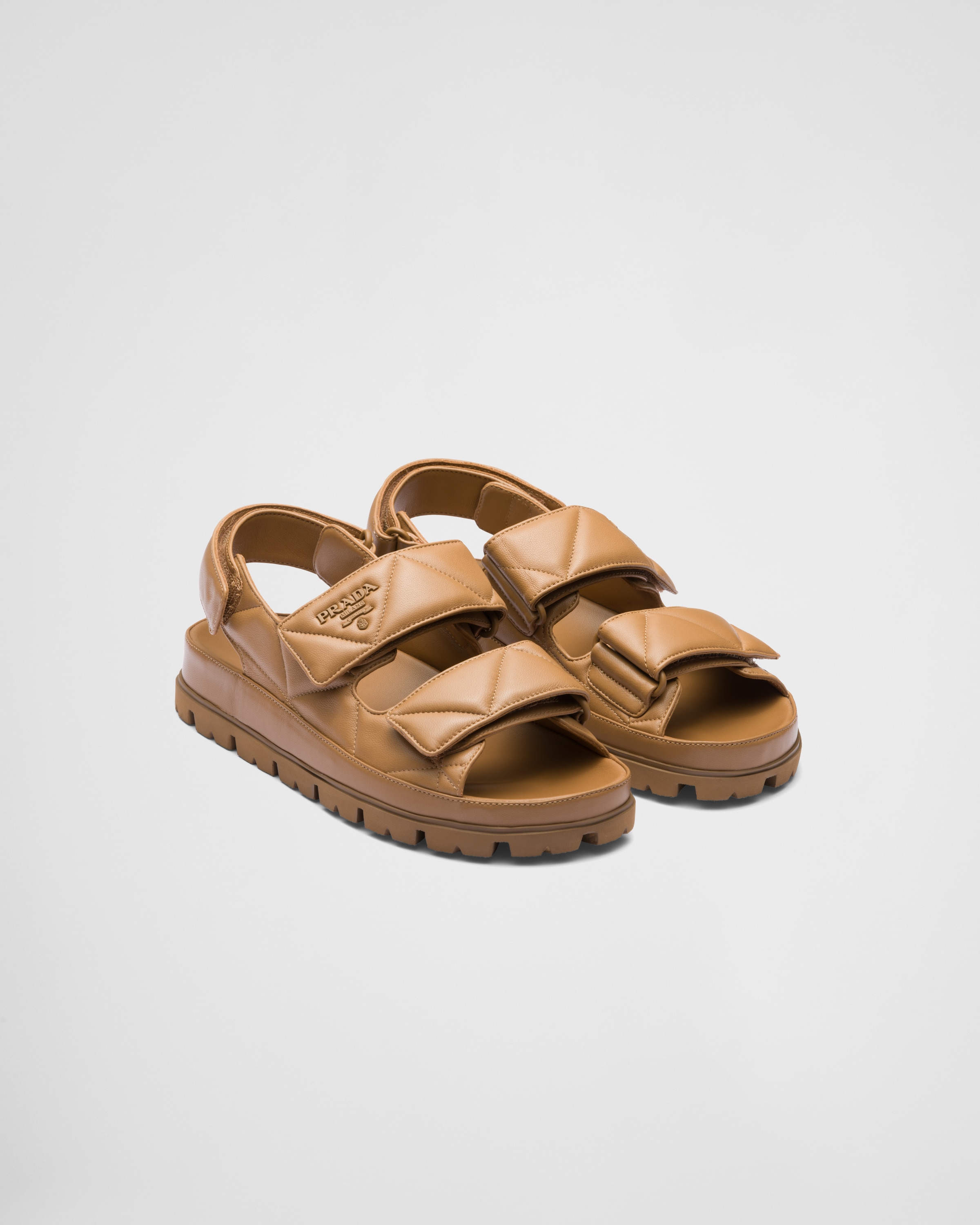 Neutral Elegance: Prada Camel Flat Sandal