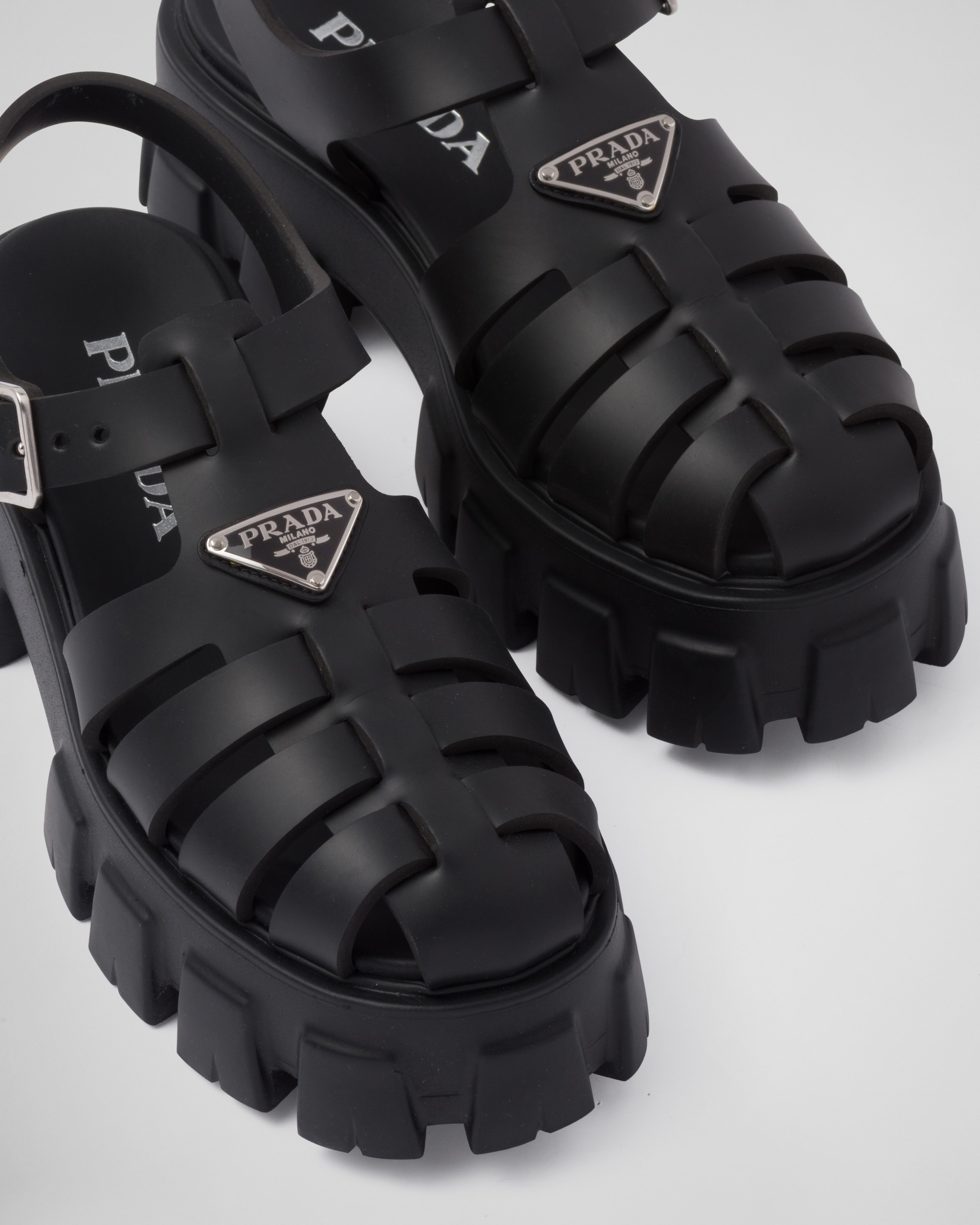 Shop Prada Rubber Monolith Sandals In Black