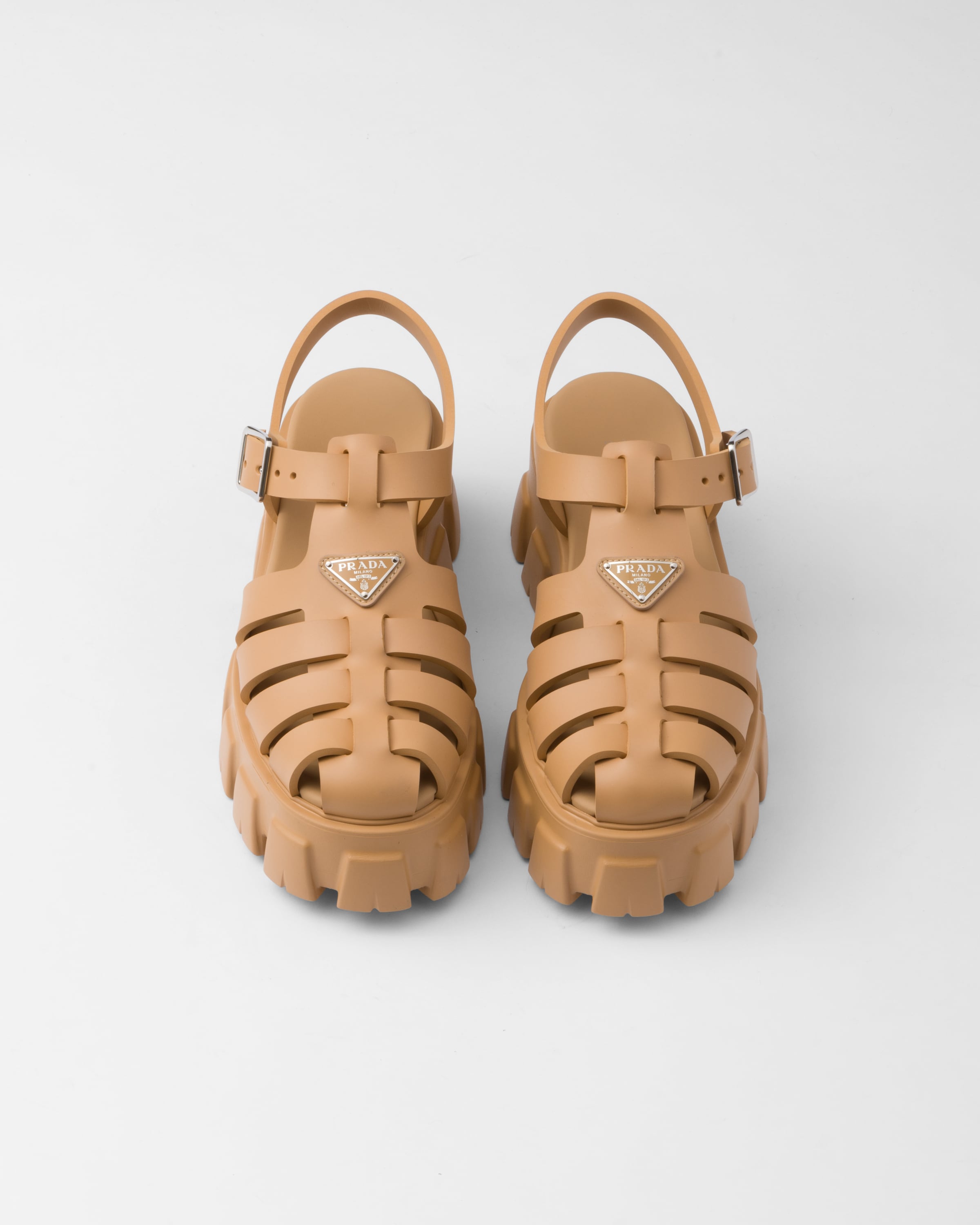 Shop Prada Rubber Monolith Sandals In Barley