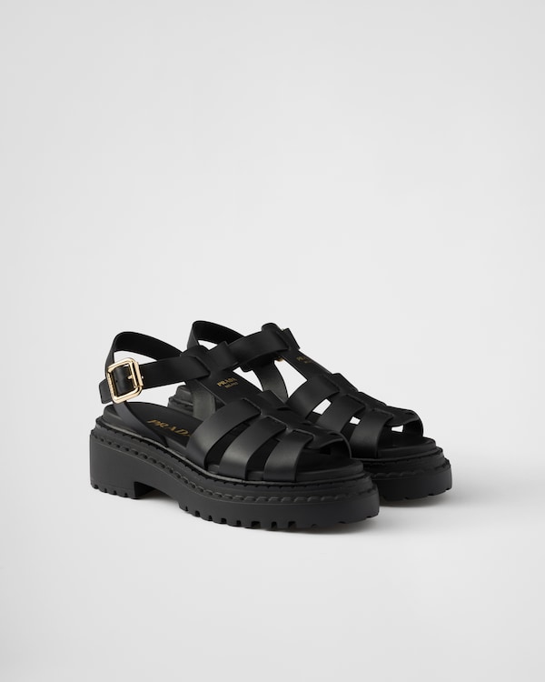 【日本入手困難】Brushed leather Monolith loafers Black Monolith patent leather loafers | PRADA