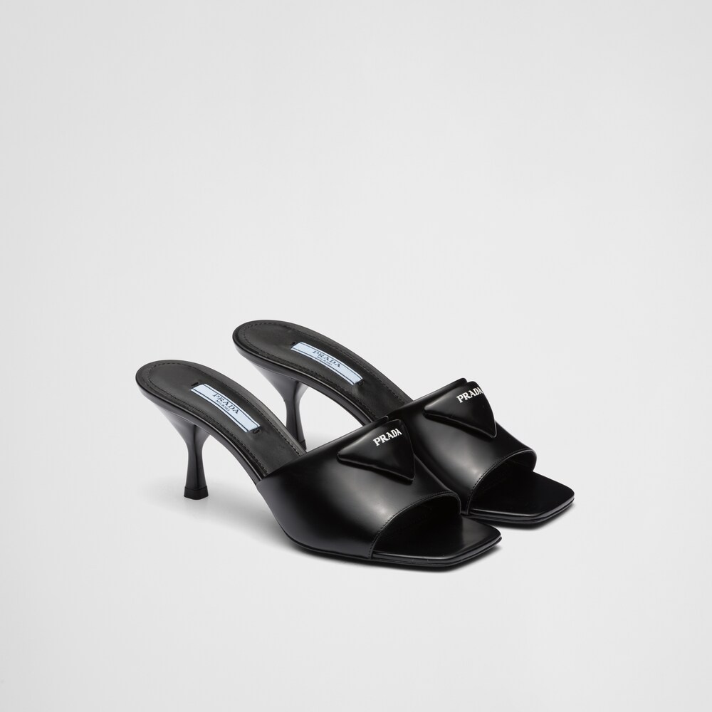 Black Brushed leather heeled slides | Prada