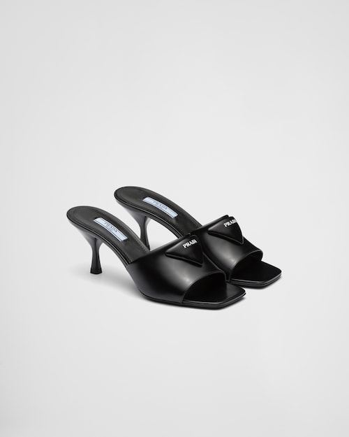 Black Brushed leather heeled slides | Prada