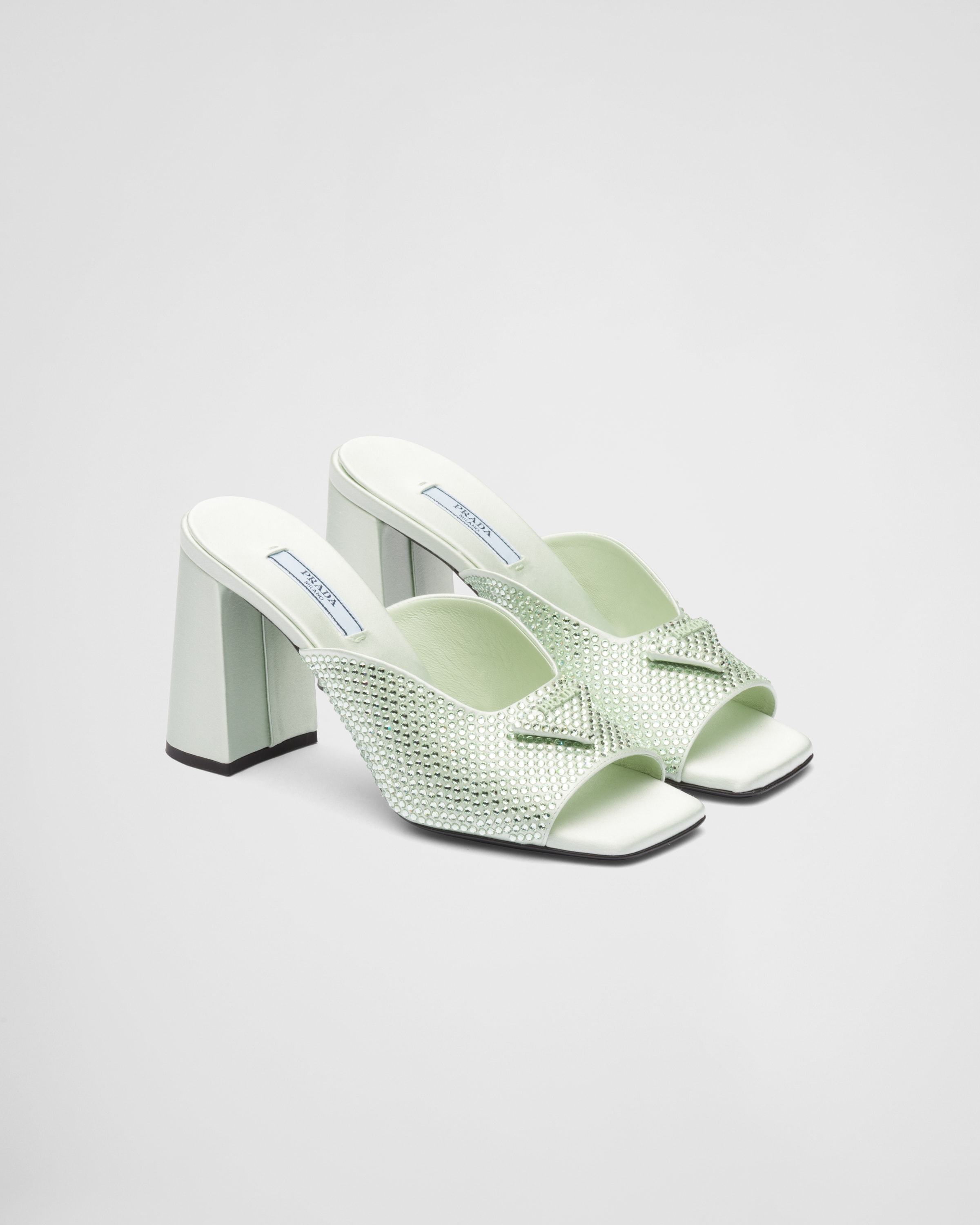 Prada cheap white mules