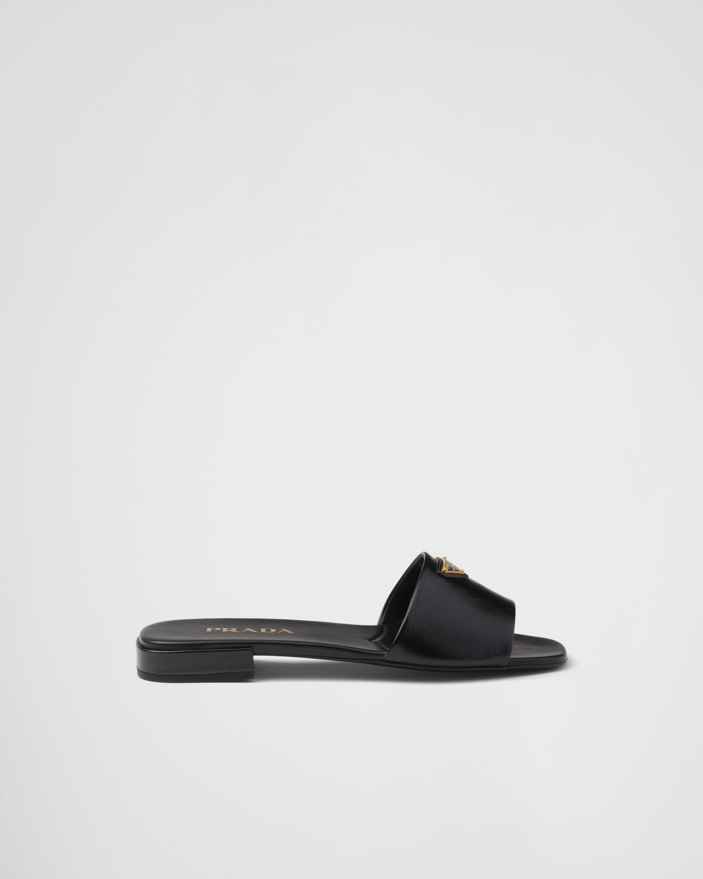 Shop Prada Saffiano Patent Leather Slides In Schwarz