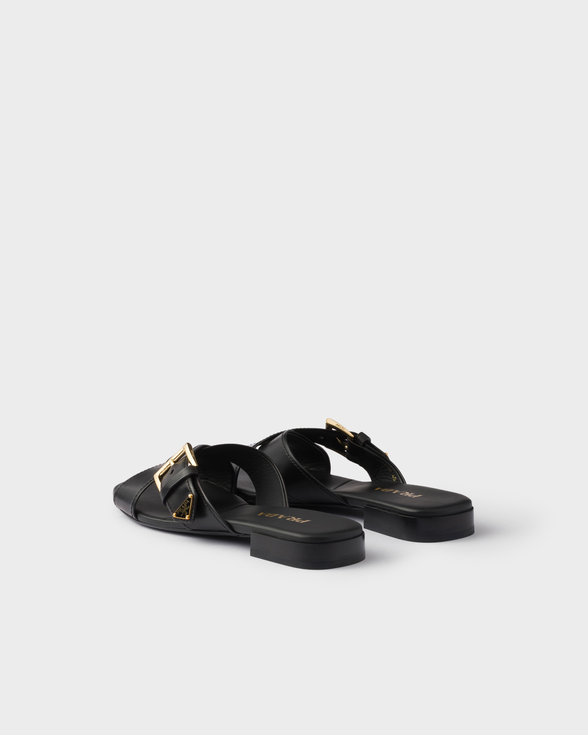 Prada Leather Crisscross Slides With Buckle In Black