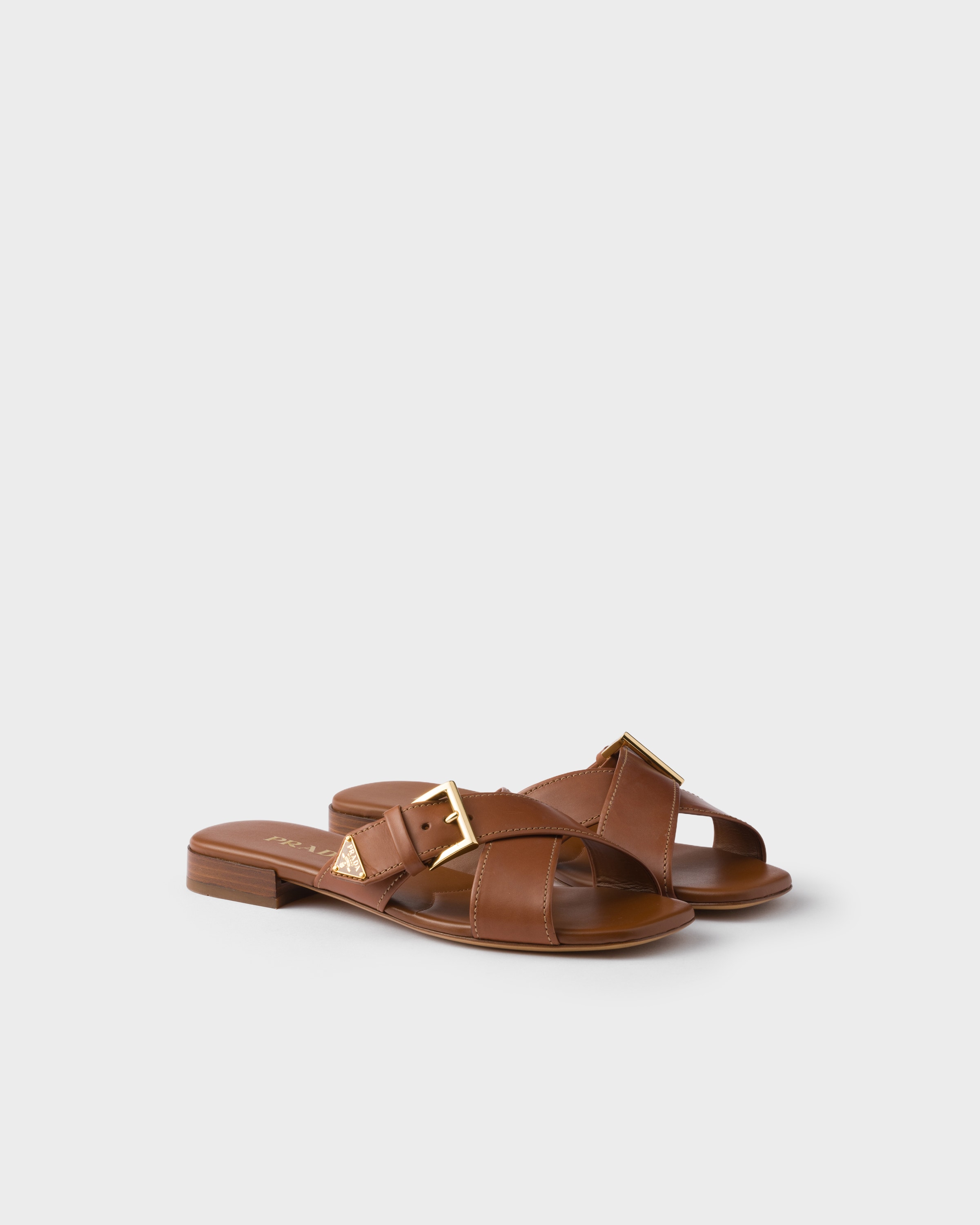 Prada Leather Crisscross Slides With Buckle In Brown