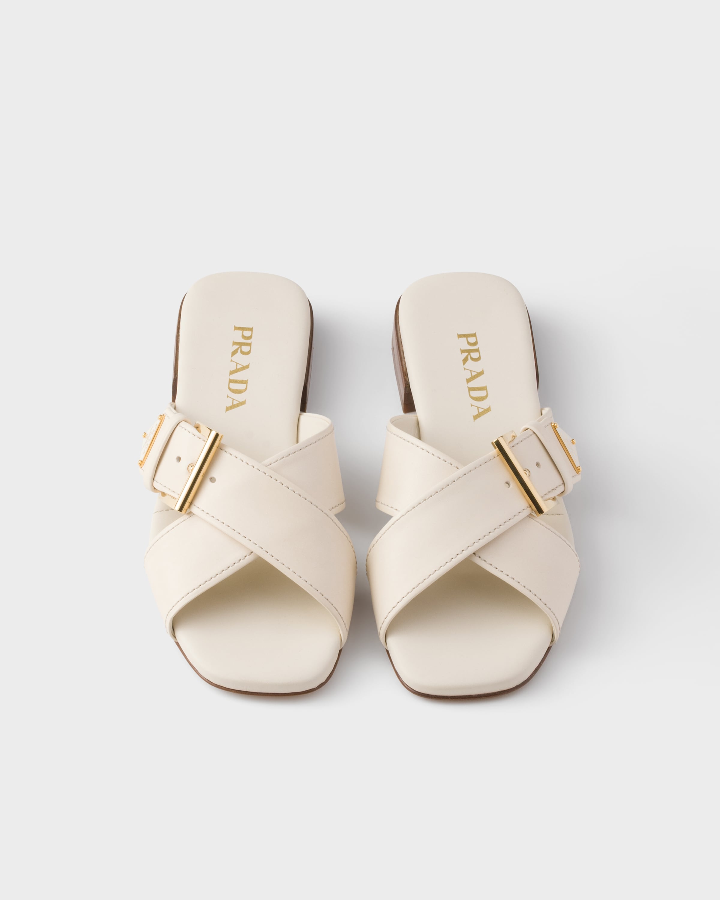Chalk White Leather crisscross slides with buckle | PRADA - United