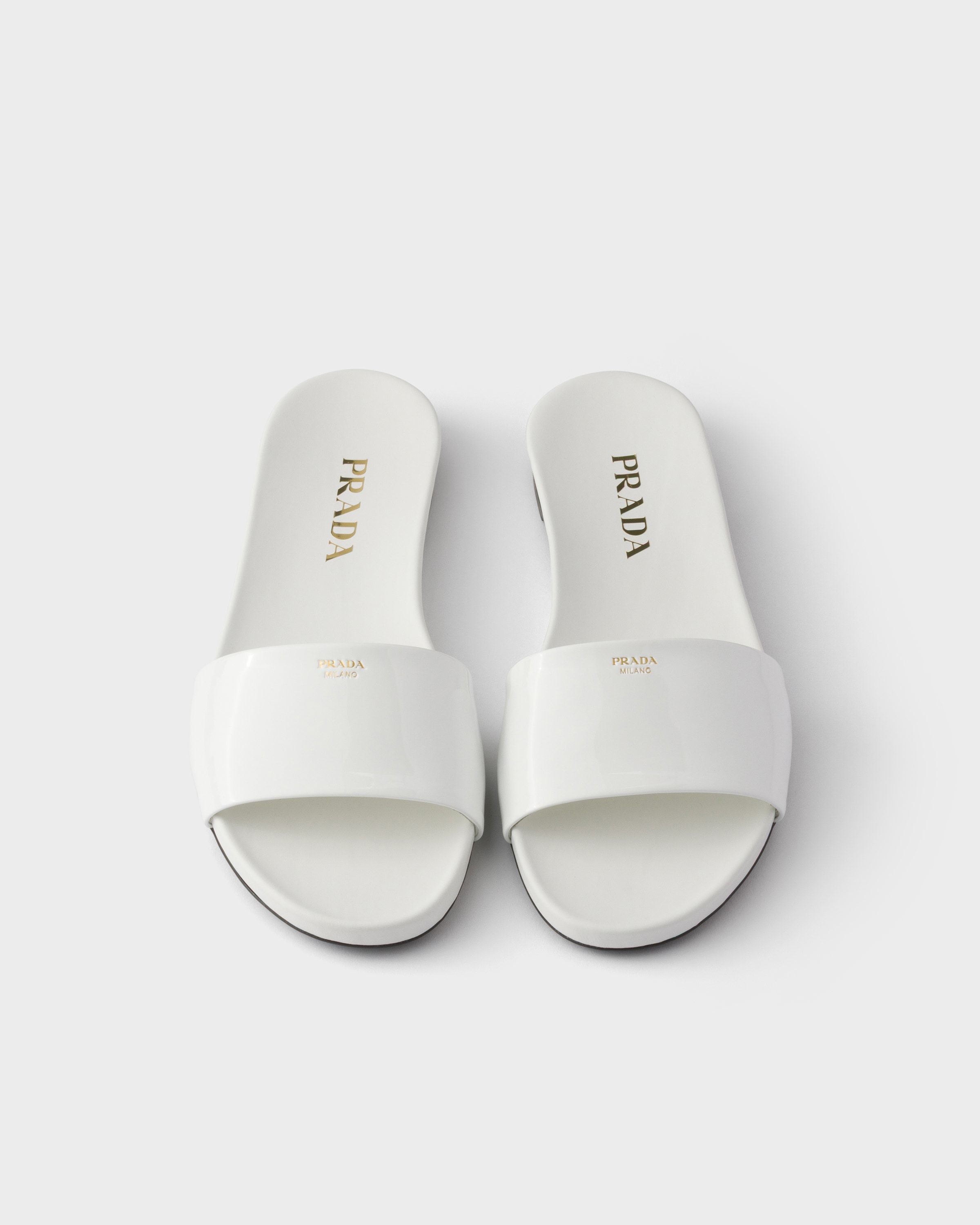 Joo♡　PRADA サンダル ホワイト 35 1/2 White Patent leather slides | PRADA - United States