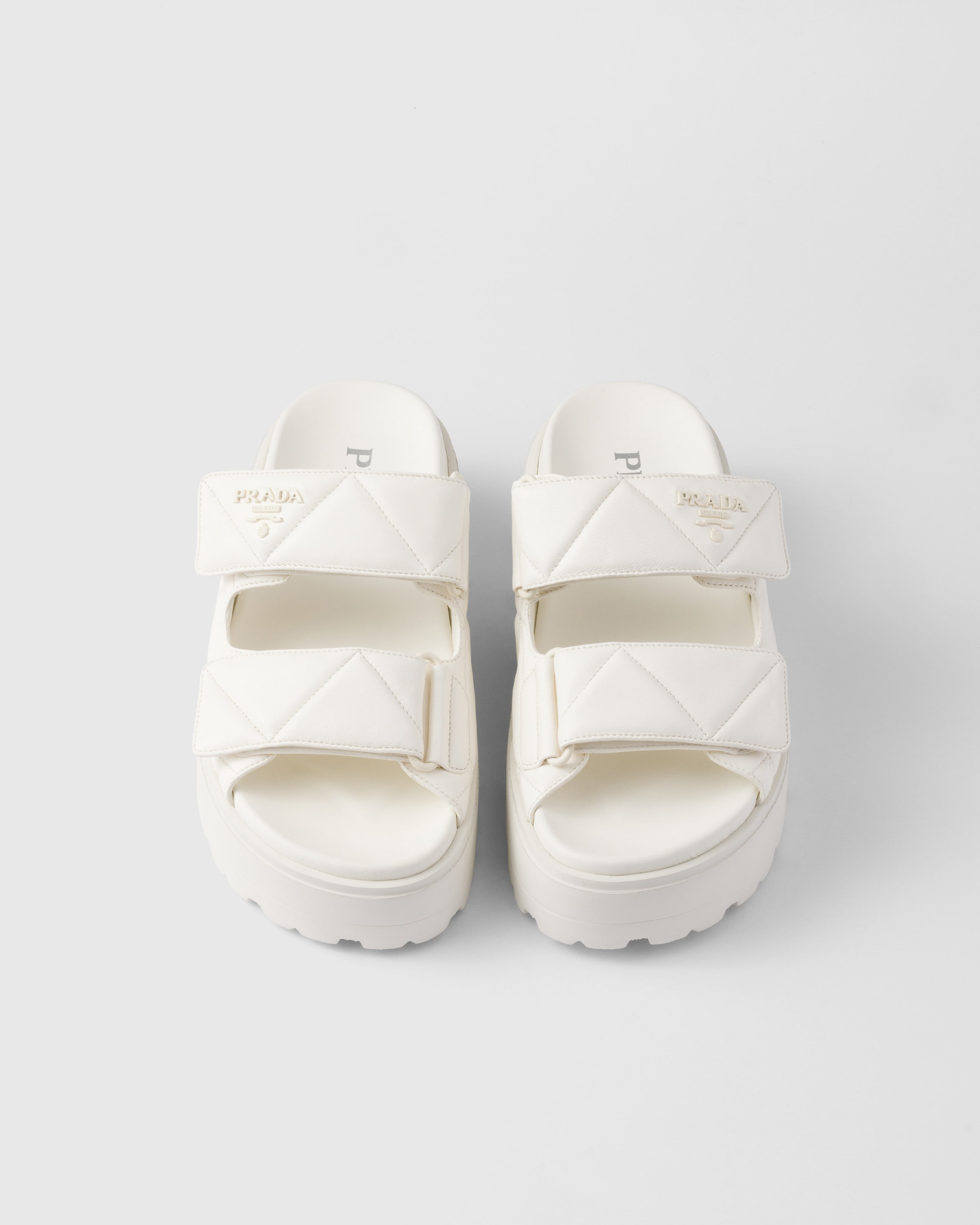 Ivory Padded Nappa Leather Slides | PRADA