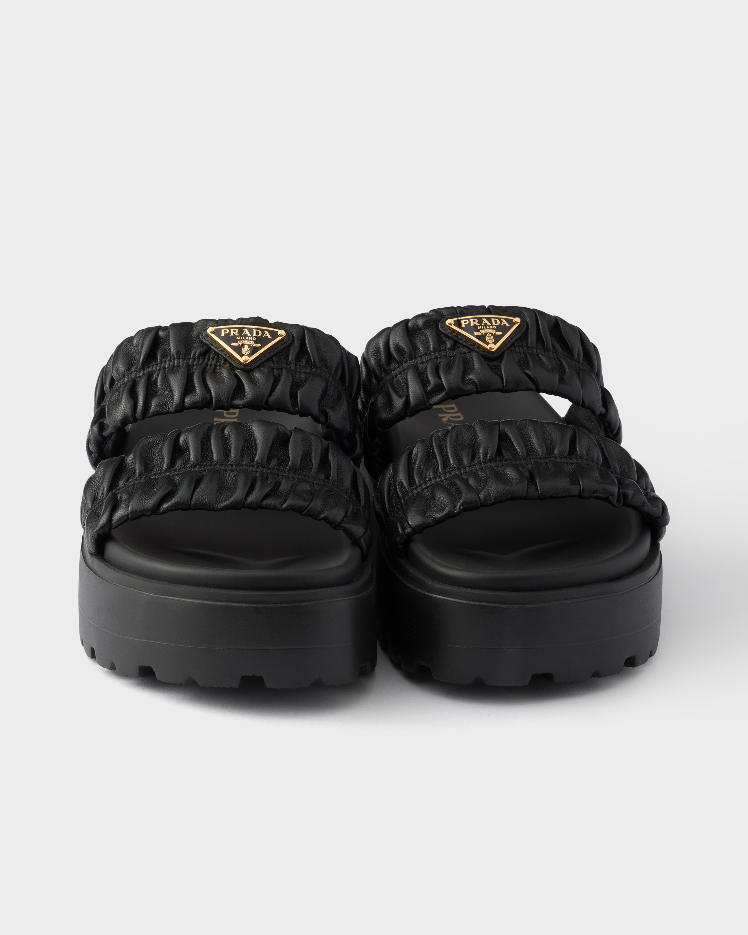 PRADAミュール Black Matelassé nappa leather flatform slides | PRADA - United States