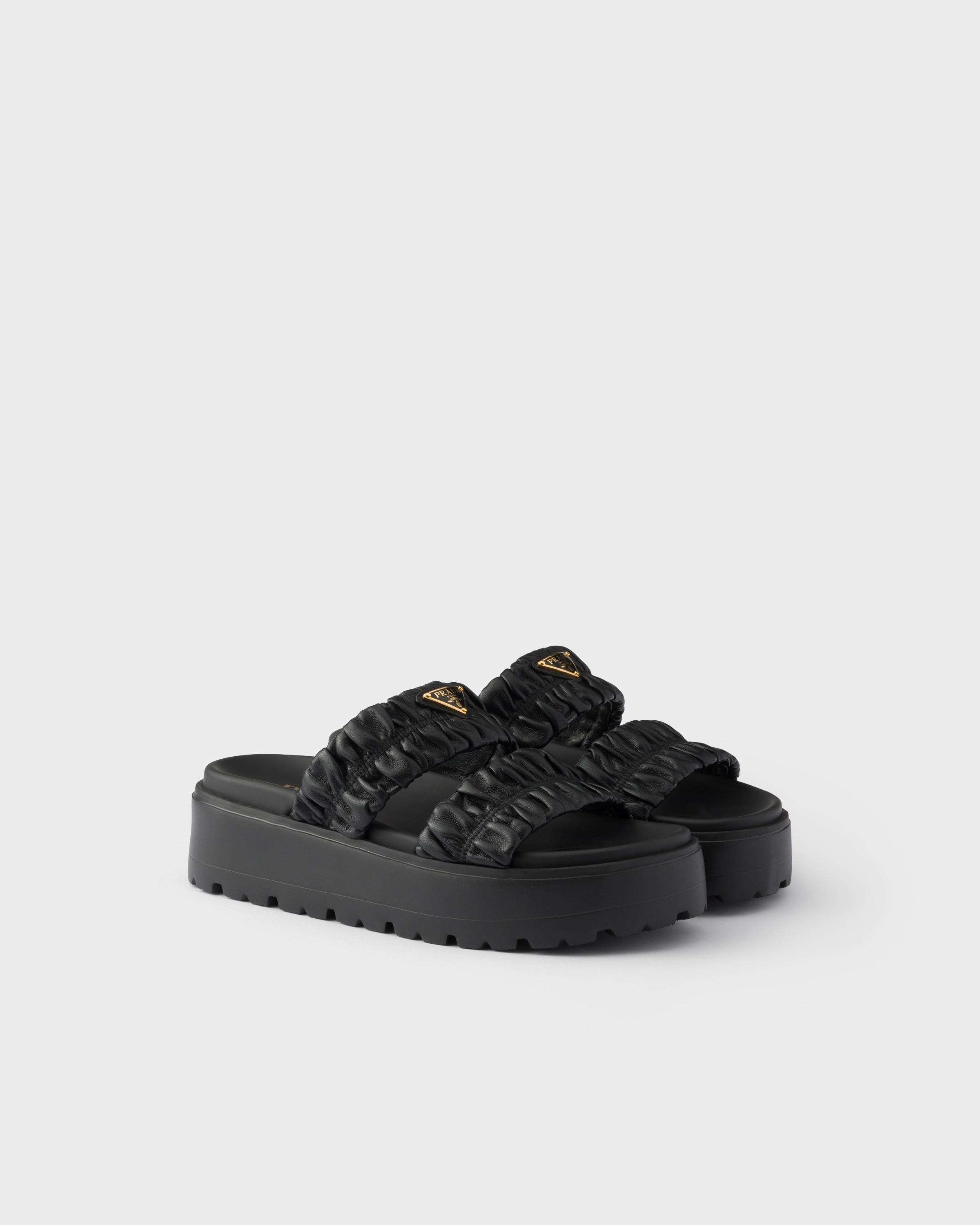 Black Matelassé nappa leather flatform slides | PRADA - United States