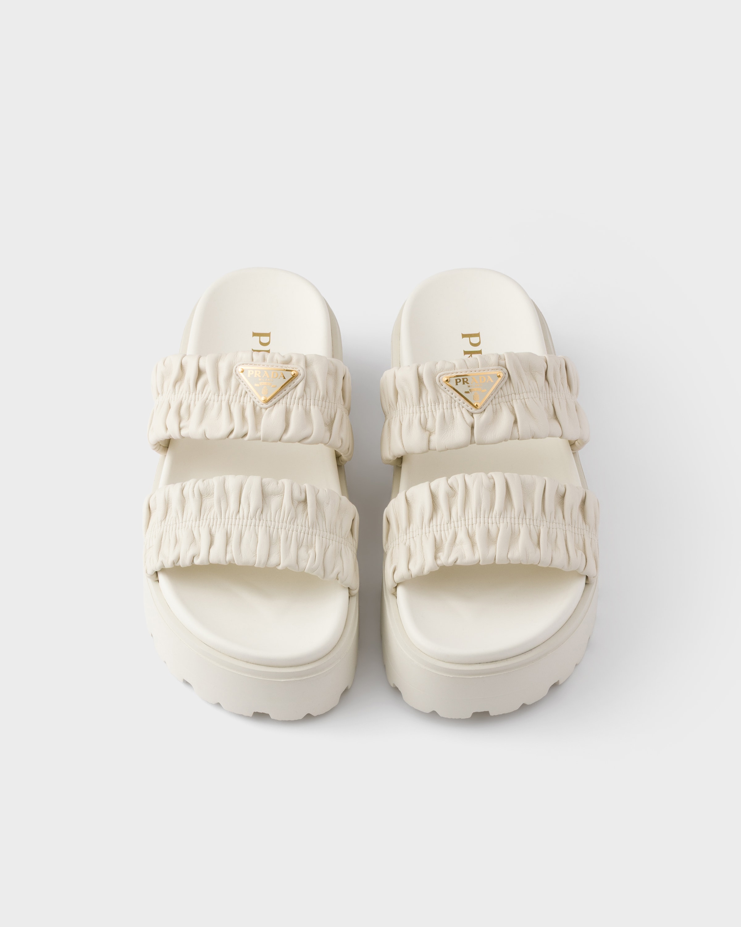 White Matelassé nappa leather flatform slides | PRADA - United States