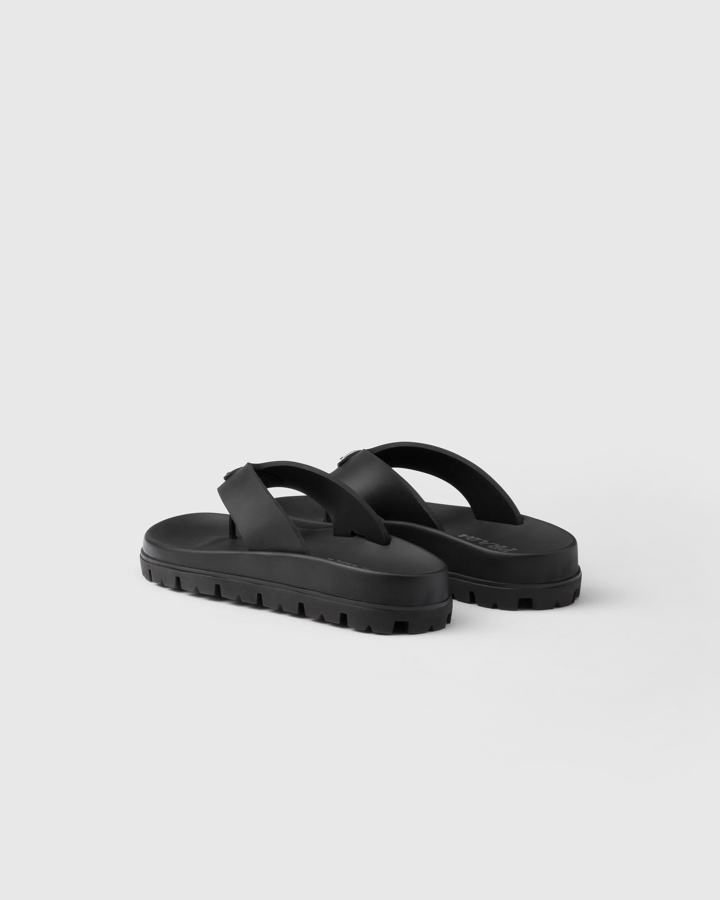 Shop Prada Rubber Thong Sandals In Black