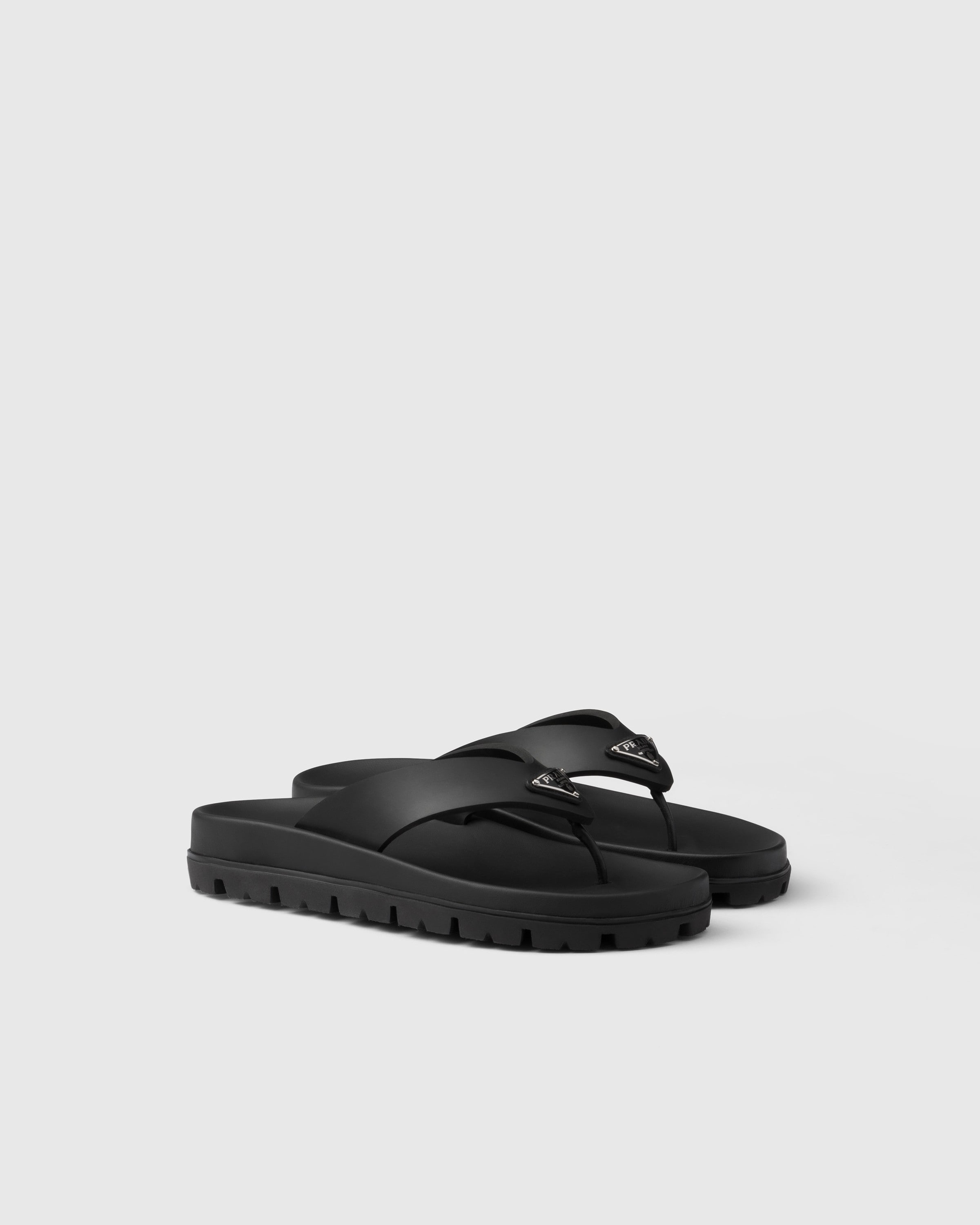 Shop Prada Rubber Thong Sandals In Black